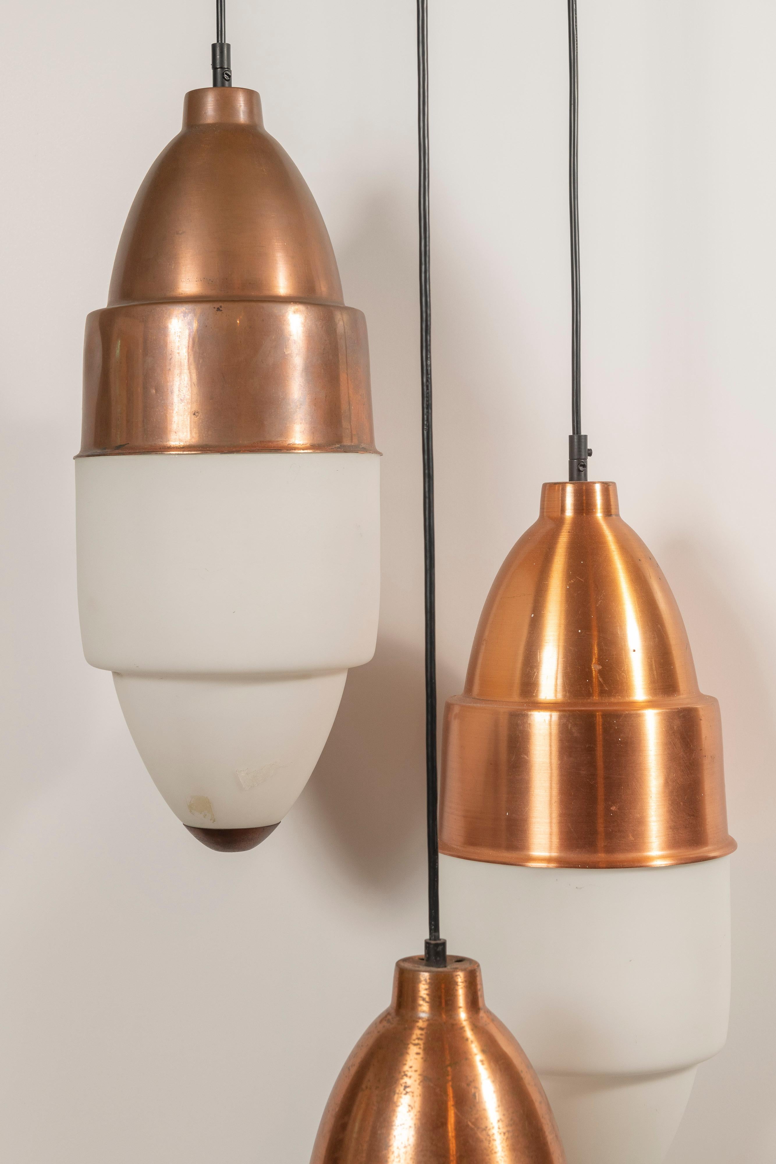 Mid-Century Modern Three Stilnovo Pendants in Copper and Opal Glass For Sale