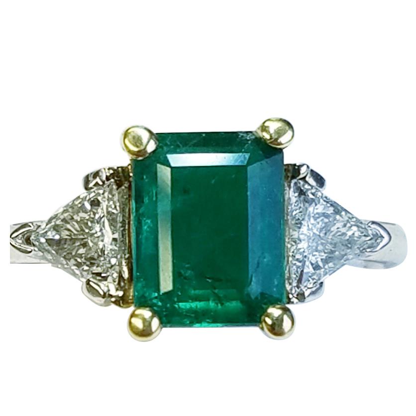 Three-Stone 18 Karat White Gold Emerald Cut Emerald and Diamond Ring