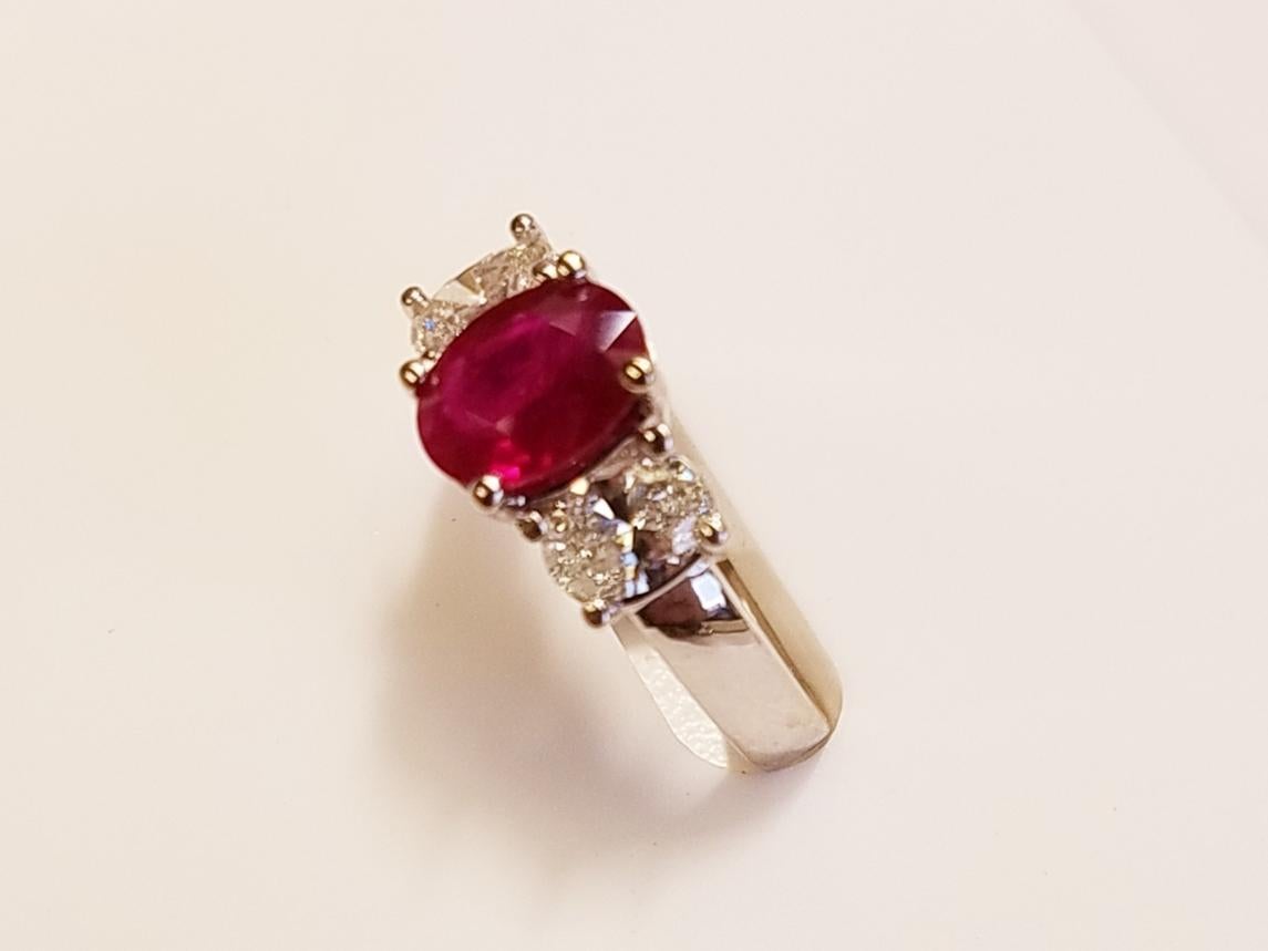 Three Stone 18 Karat White Gold Oval Cut Ruby and Diamond Ring
1.38 Carats of Rubies
0.77 Carats of Diamonds 
Oval Cut
18 Karat white gold 
