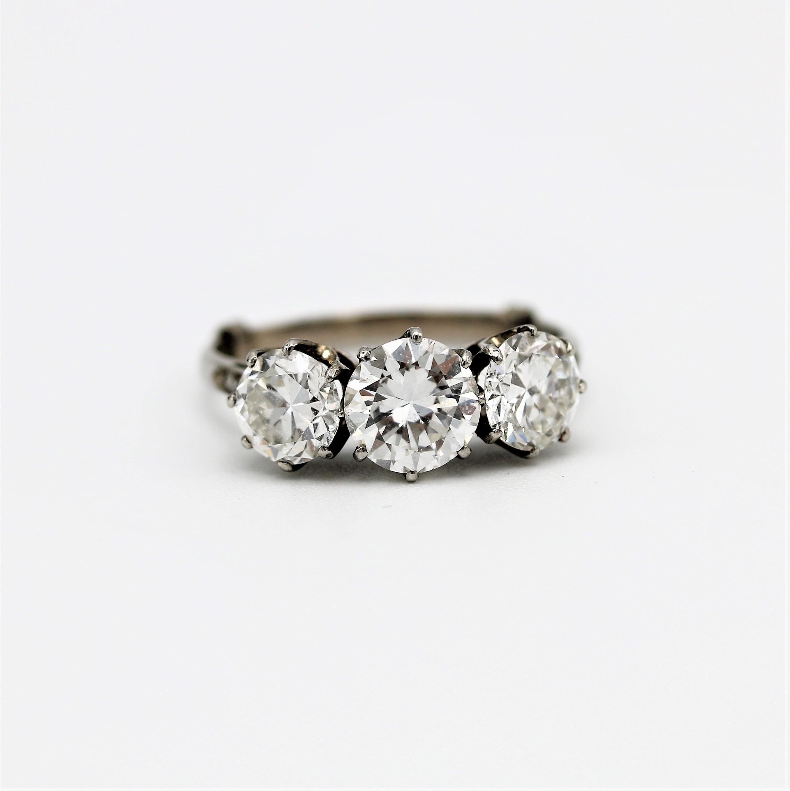 Brilliant Cut Three stone 2.6 carat transitional cut diamond engagement ring, circa 1940 For Sale