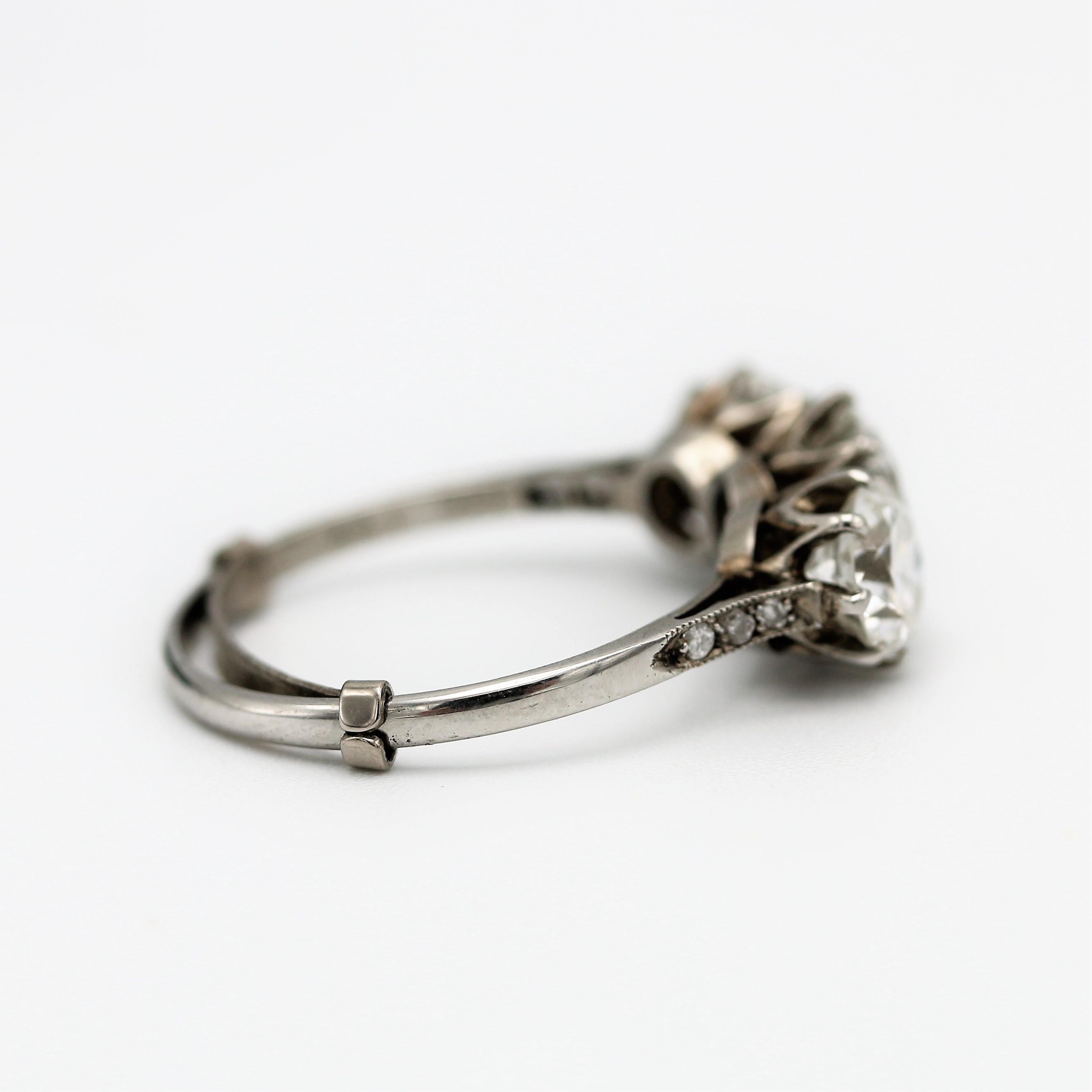 Women's Three stone 2.6 carat transitional cut diamond engagement ring, circa 1940 For Sale