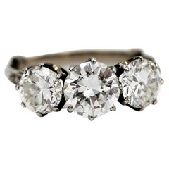 Three stone 2.6 carat transitional cut diamond engagement ring, circa 1940