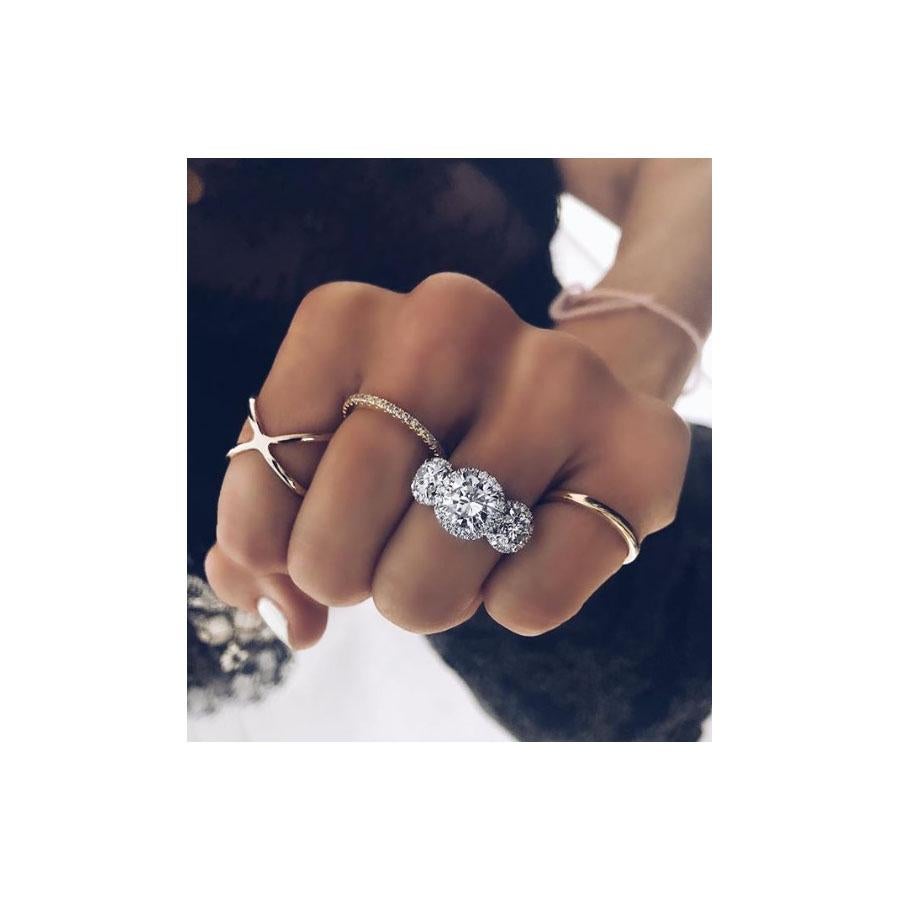 Modern Three-Stone 3.21 Carat Diamond Halo Set Engagement Ring Platinum GIA