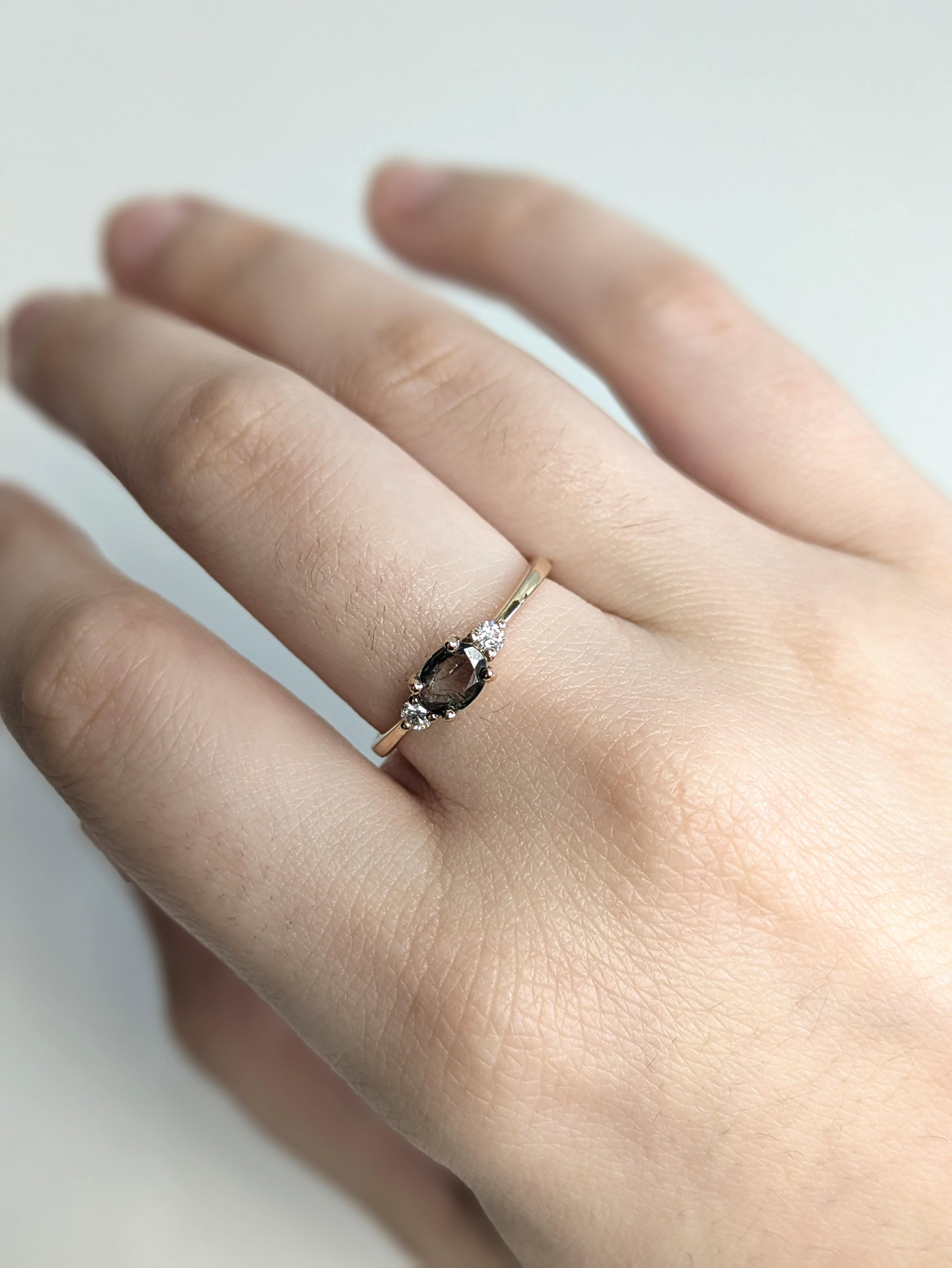 Perfect for a meaningful gift or engagement, this three-stone ring features a rare 0.46ct oval alexandrite between two natural diamonds. Crafted in solid 14K rose gold, it symbolizes past, present, and future with a touch of magical