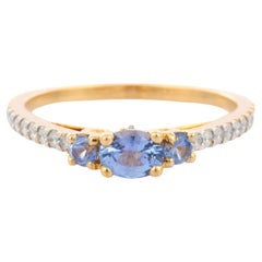 Three Stone Blue Sapphire and Diamond Engagement Ring in 14K Yellow Gold