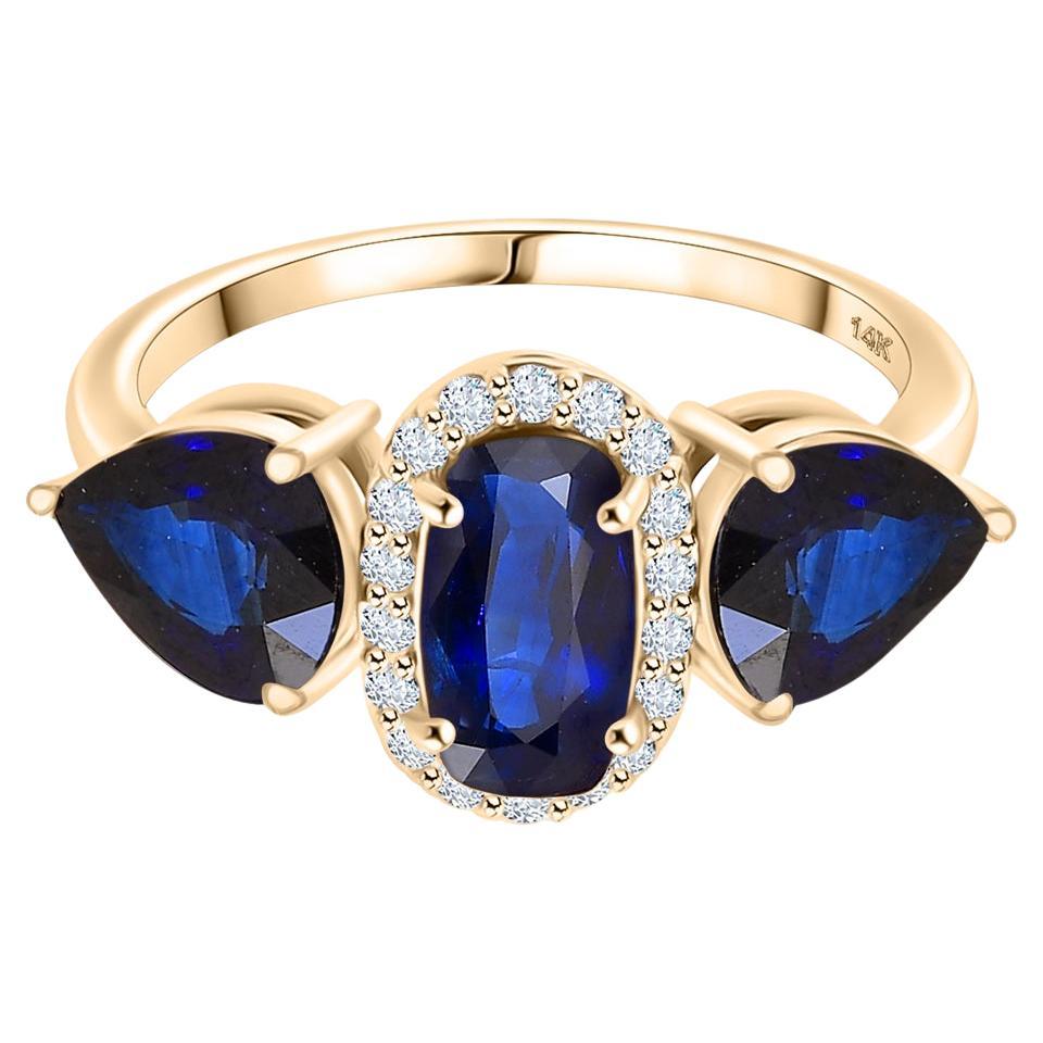 Three Stone Blue Sapphire Engagement Ring with Diamonds in 14k Yellow Gold