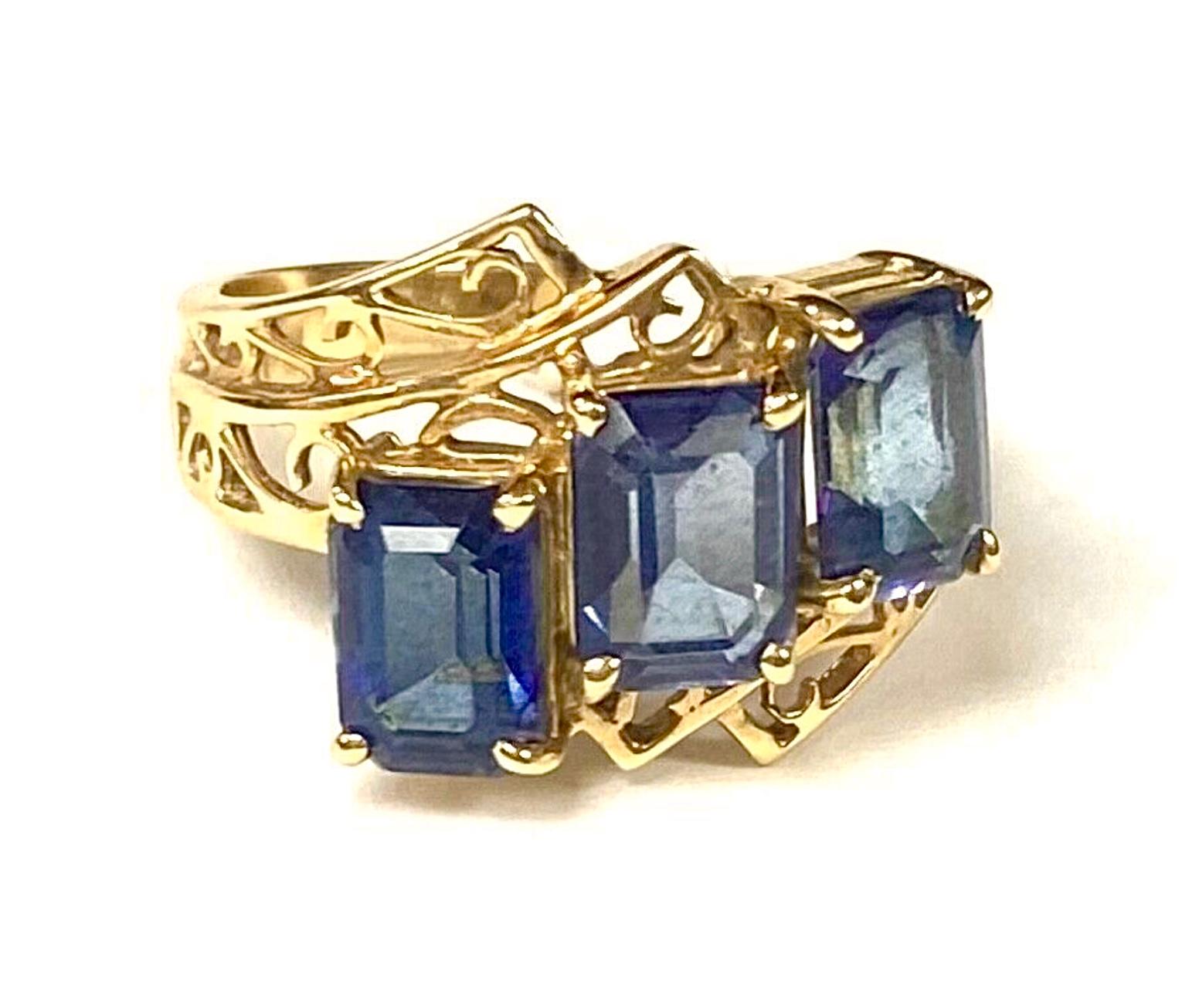 Emerald Cut Three Stone Blue Topaz 10K Yellow Gold Ring For Sale