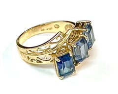 Three Stone Blue Topaz 10K Yellow Gold Ring