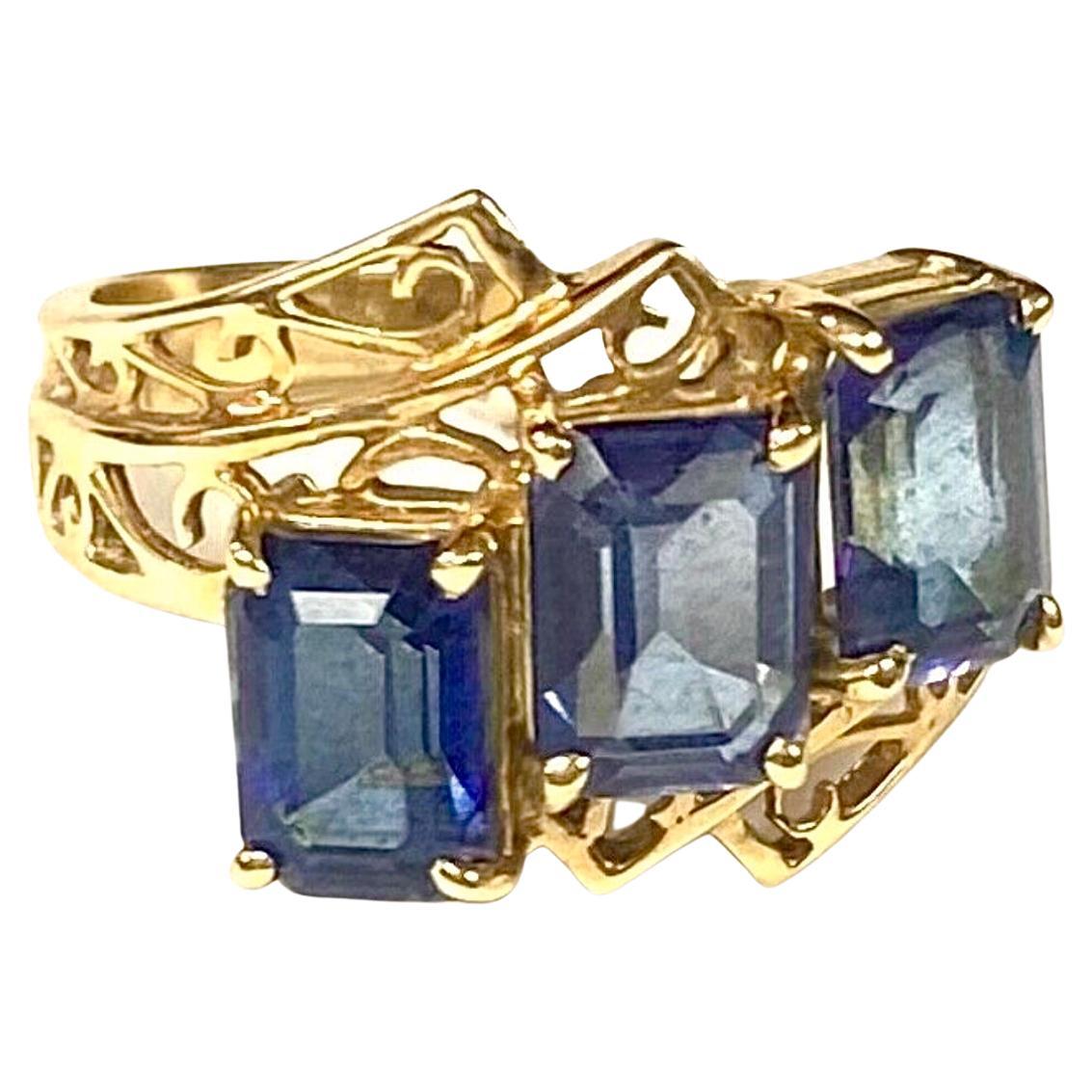 Three Stone Blue Topaz 10K Yellow Gold Ring For Sale