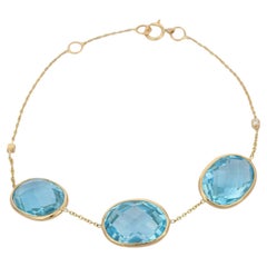 Three Stone Blue Topaz Chain Bracelet in 18 Karat Solid Yellow Gold