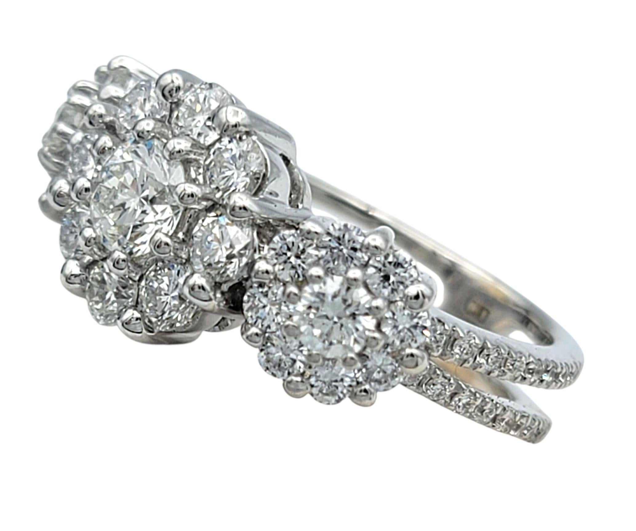 This radiant diamond ring features a bold floral-inspired center that sparkles with incredible brilliance. The middle cluster forms a perfect bloom, with each diamond arranged to create a full, rounded silhouette that catches the light from every