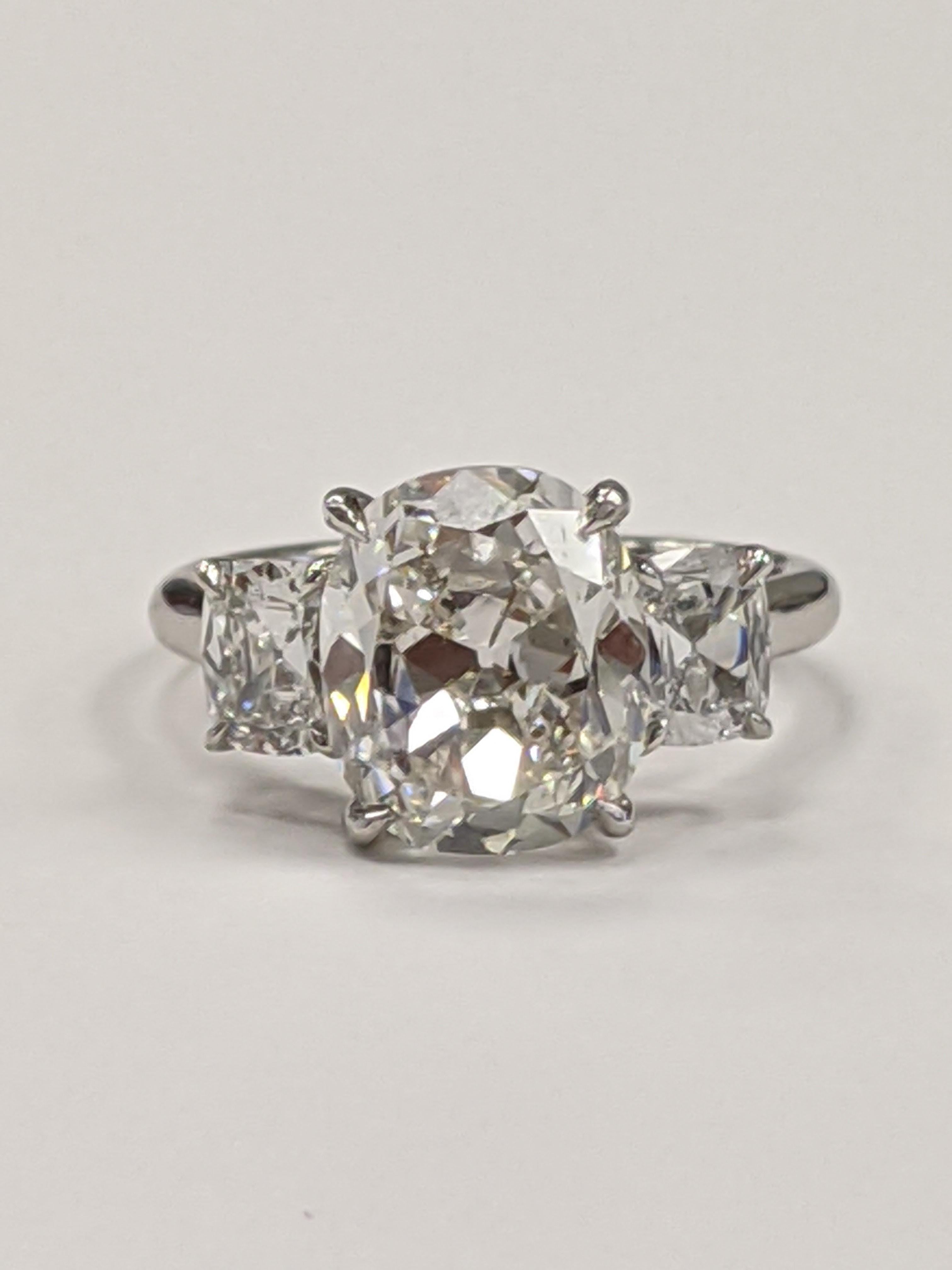 Women's Three-Stone Cushion Diamond Ring Featuring 4 Carat G VS2 in Platinum 'GIA'