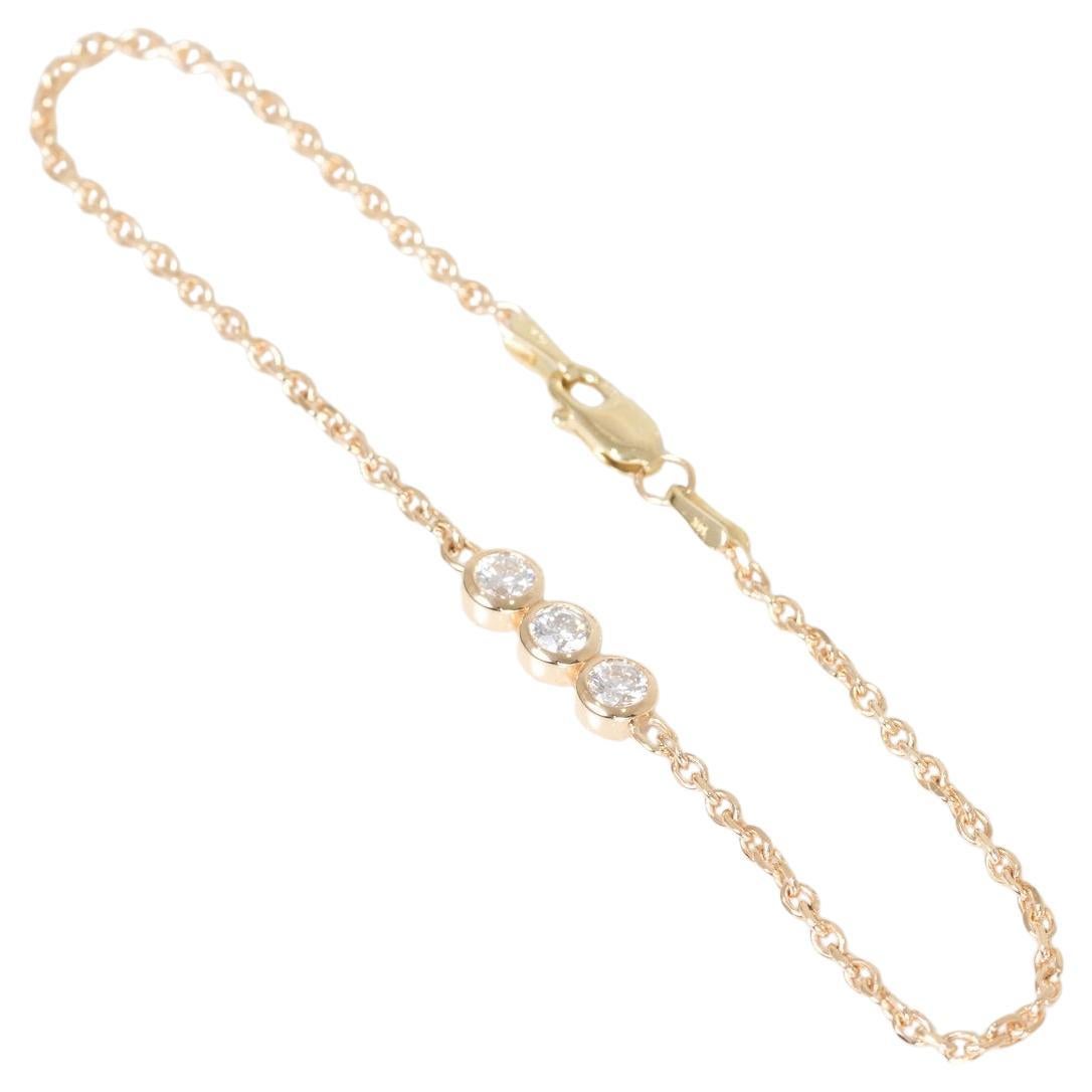 Bracciale a catena con tre pietre e diamanti