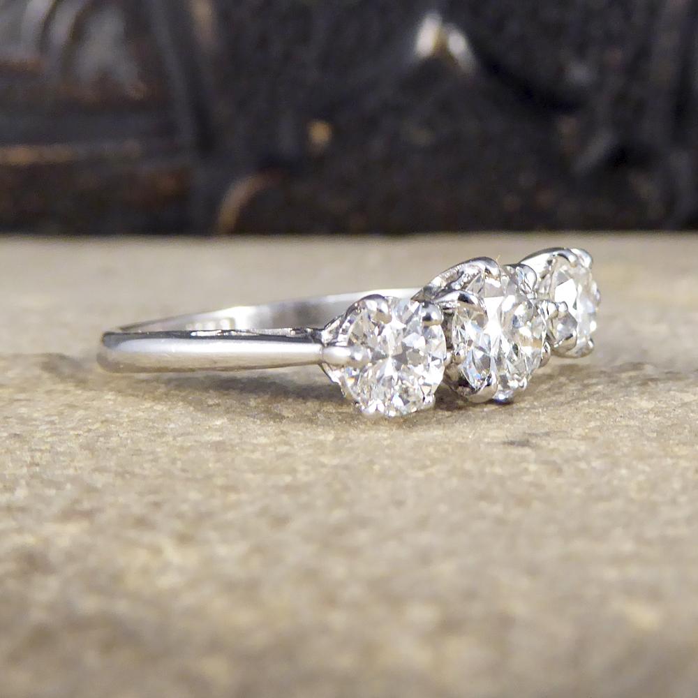 The three beautifully sparkly Round cut Diamonds are set in an 18ct white Gold and Platinum eight claw setting, and weigh approximately 1.25ct in total. With a low setting measuring 5mm from the finger this ring can be easily worn on a daily basis.