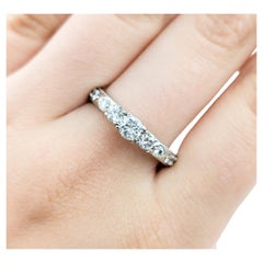 Three-Stone Diamond Engagement Ring with Milgrain Details in White Gold