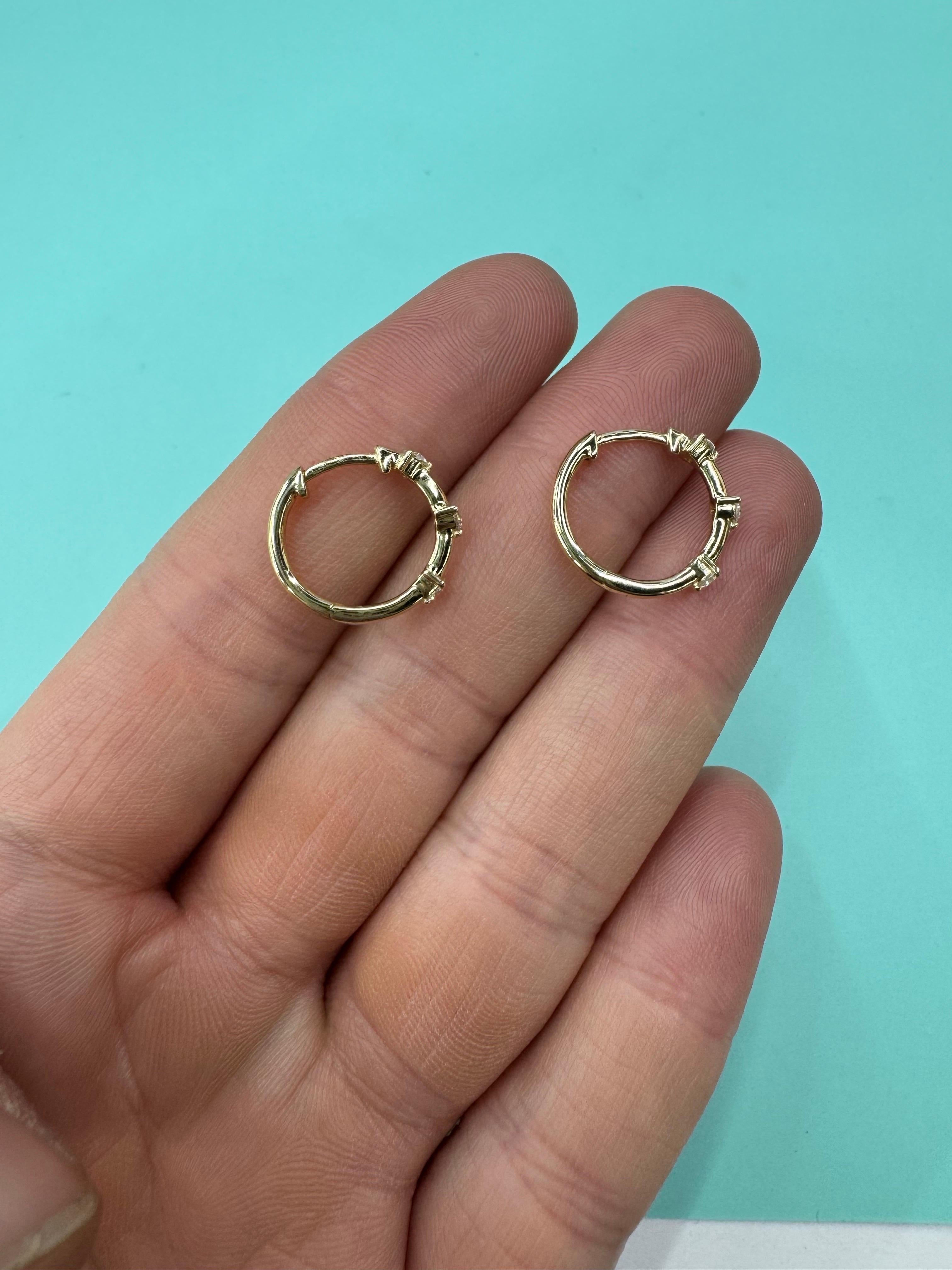 Round Cut Three Stone Diamond Huggie Hoop Earrings 0.32 Carats 14 Karat Yellow Gold For Sale