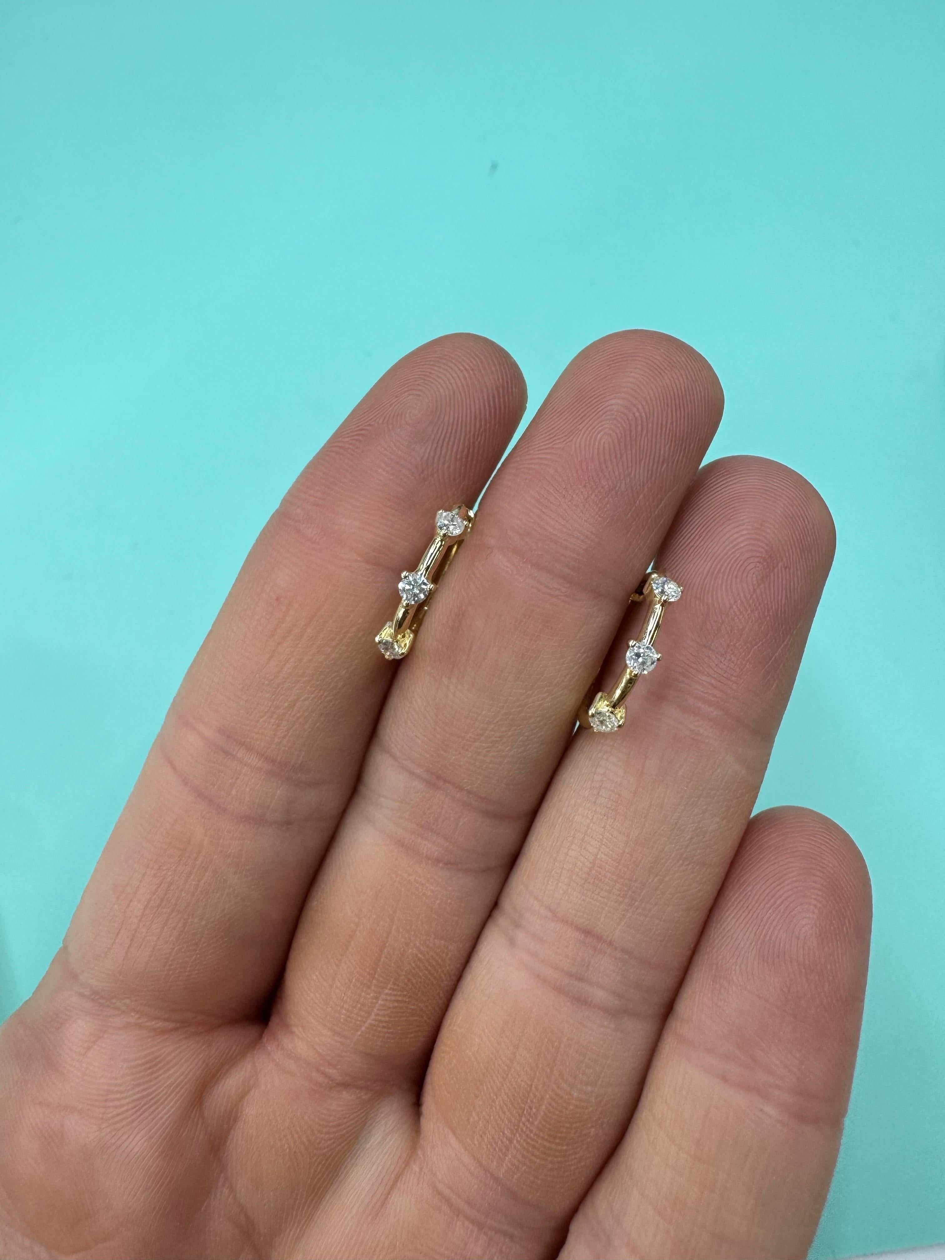 Three Stone Diamond Huggie Hoop Earrings 0.32 Carats 14 Karat Yellow Gold In New Condition For Sale In New York, NY