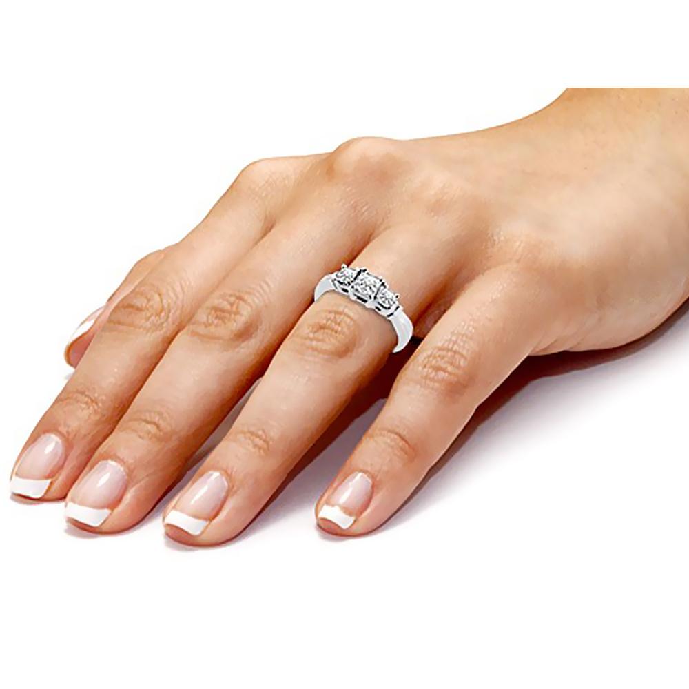 For Sale:  Three Stone Diamond Ring 0.55 ct. tw. 4