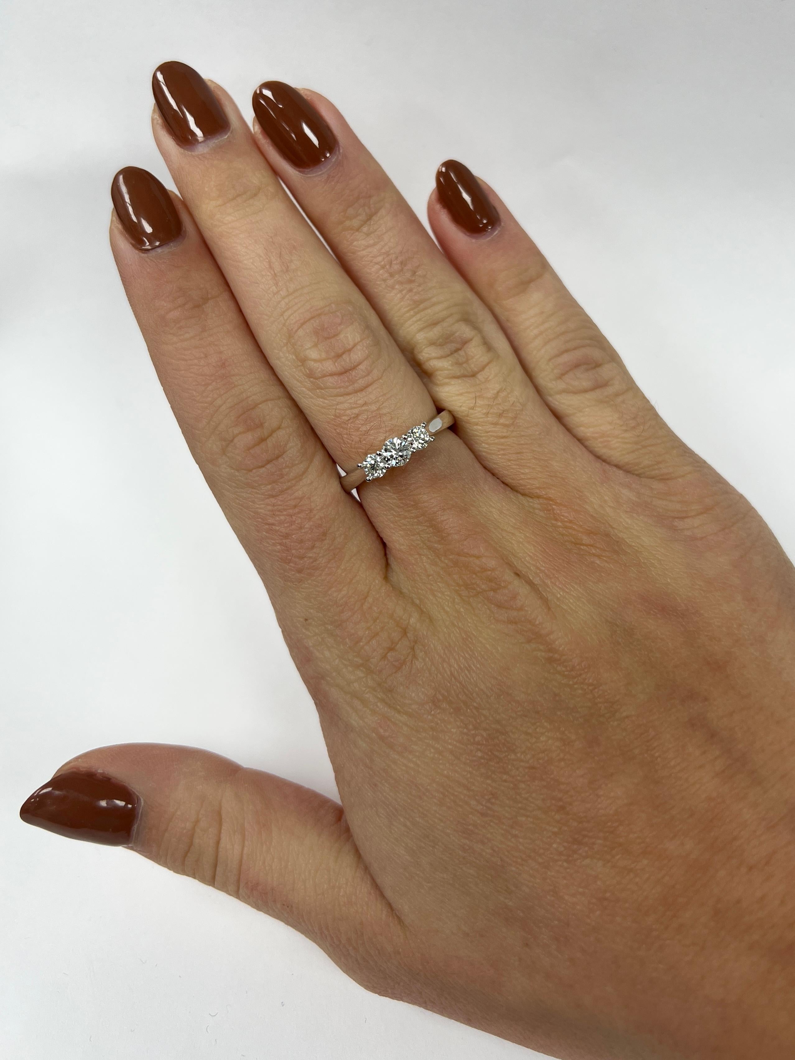 Modern Three Stone Diamond Ring For Sale