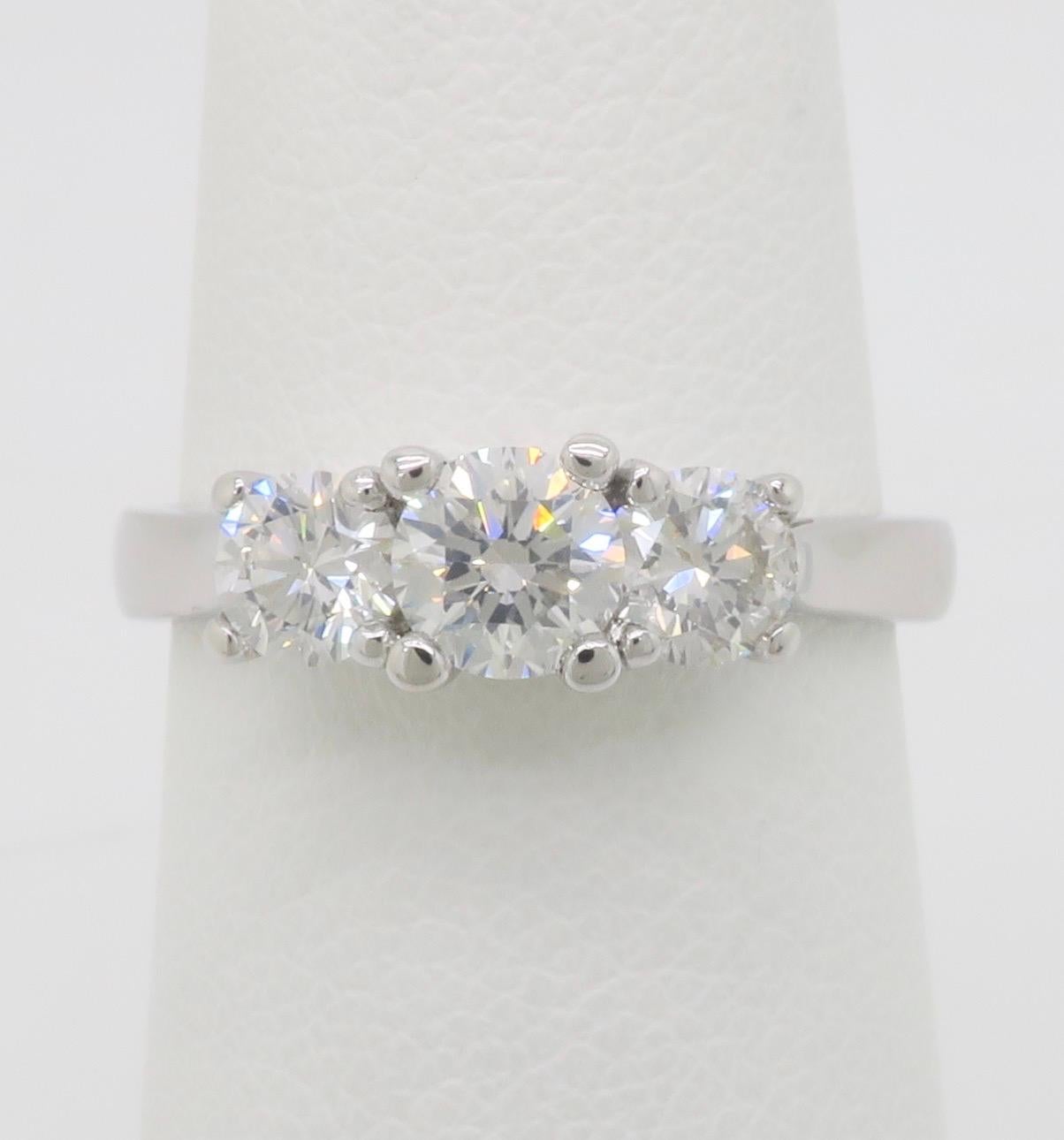 Round Cut Three Stone Diamond Ring