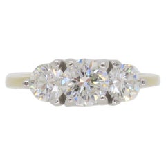 A. Stone, anello con tre pietre e diamanti