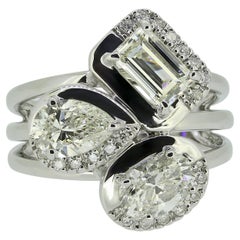 Bague à trois pierres et diamants