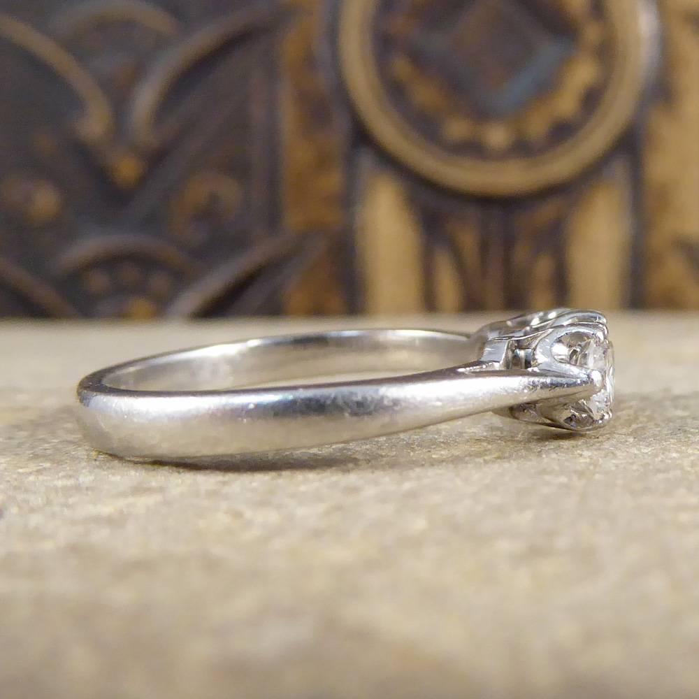 Modern Three-Stone Diamond Ring in Platinum