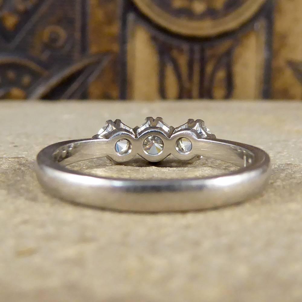 Round Cut Three-Stone Diamond Ring in Platinum