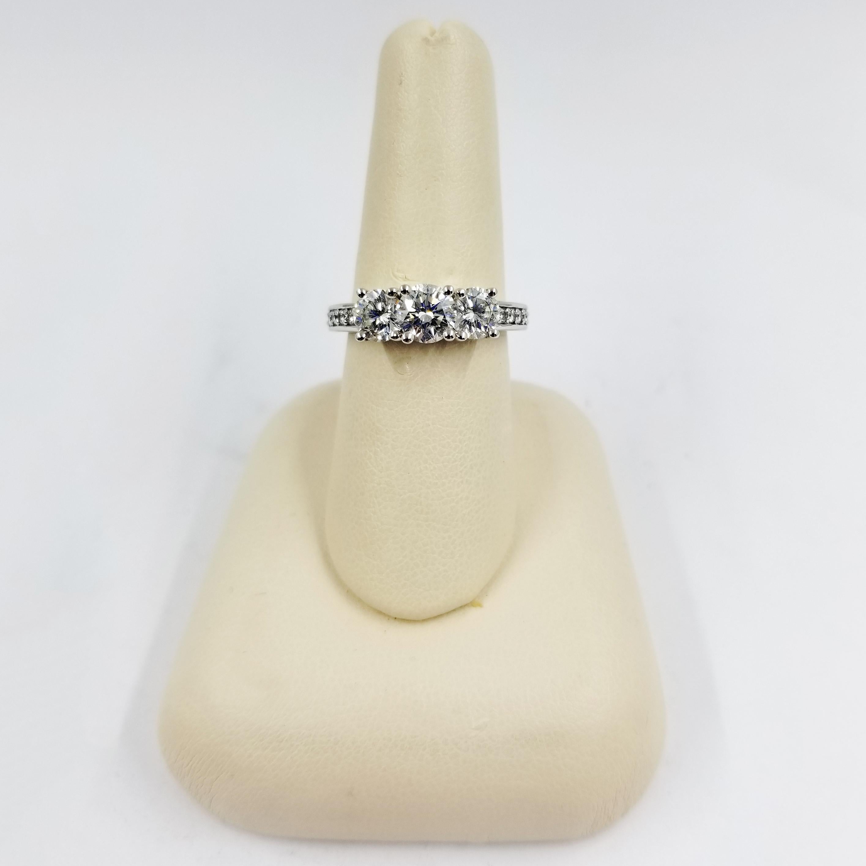 Round Cut Three-Stone Diamond Ring with Accents For Sale