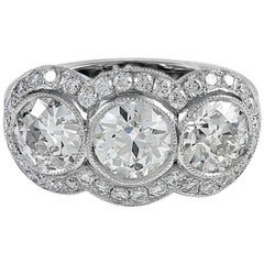Three-Stone Diamond Ring with Diamond Halo