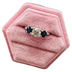 Three stone diamond sapphire ring platinum tulip diamond ring floral design