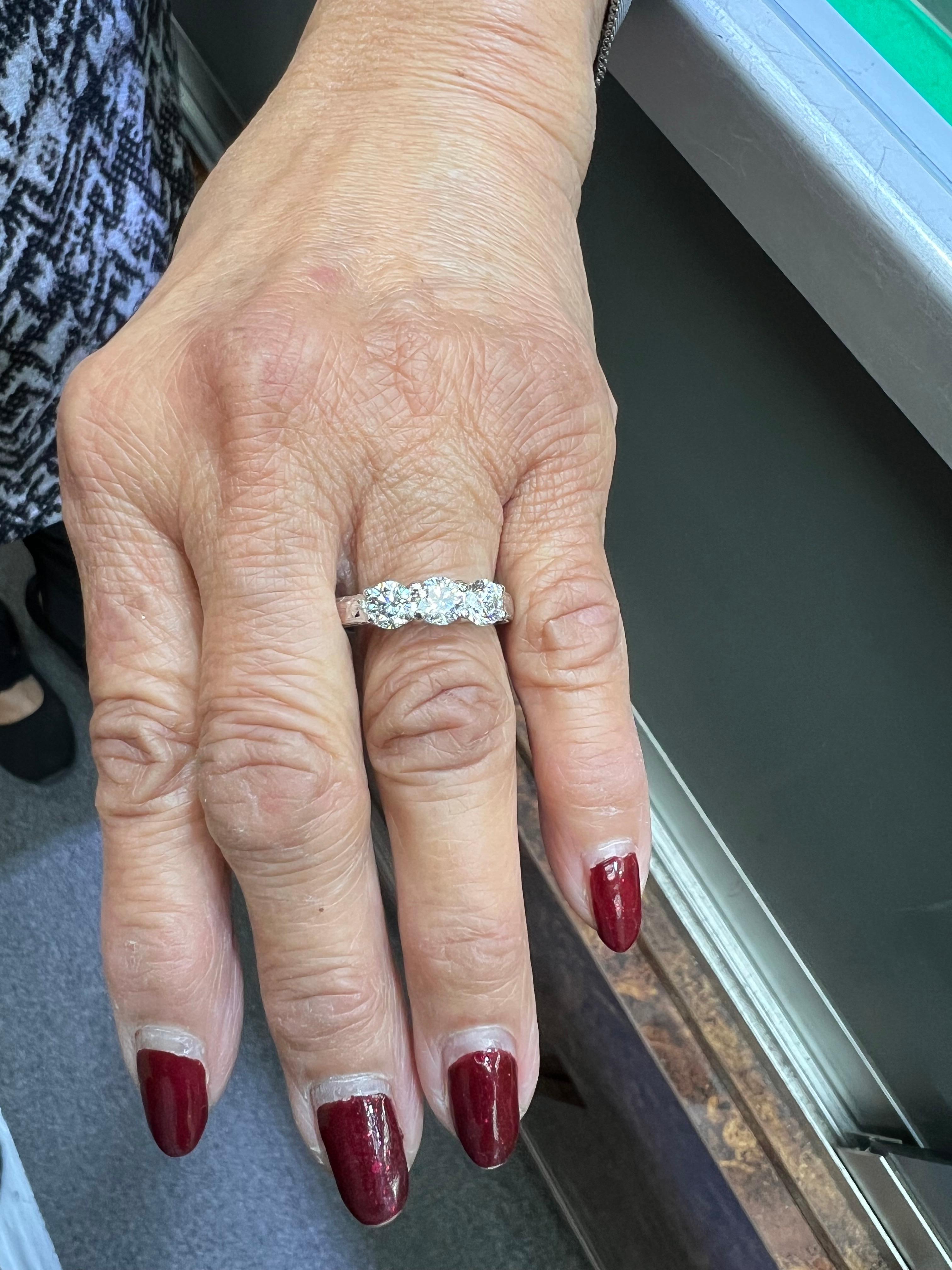 Three Stone Diamond white gold engagement ring.

The Three Stone Diamond White Gold Engagement Ring represents a profound symbol of love and commitment, encapsulating the journey of a relationship through its unique design. Traditionally, the