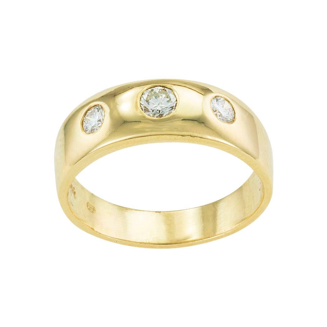 Three-stone diamond yellow gold ring circa 1960. *

ABOUT THIS ITEM:  #R-DJ47G. Scroll down for detailed specifications.  The three diamonds are burnish-set on a bright, shiny yellow gold band.  It is a classic design that has been around for