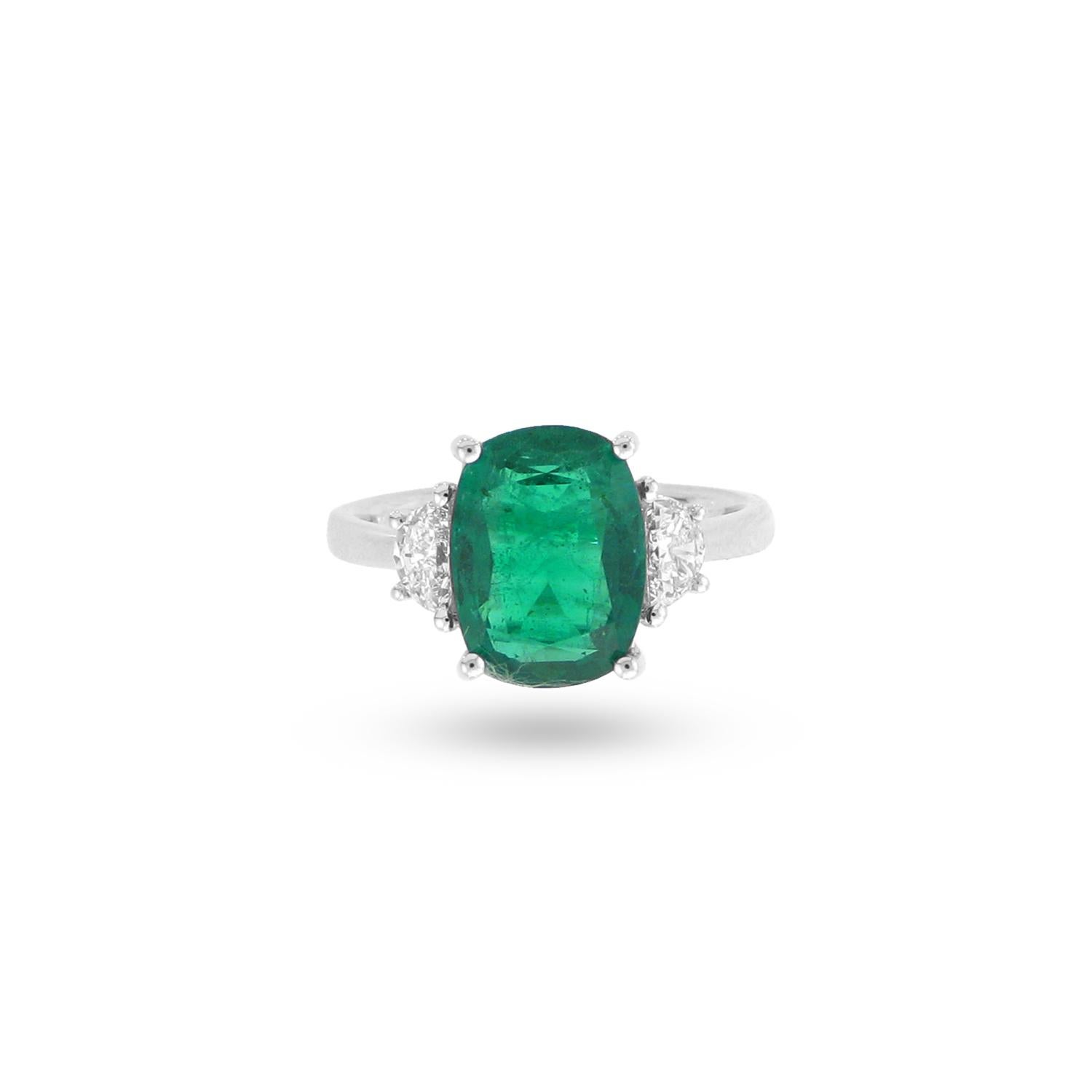 Bleau NY's latest collection. A beautiful three stone ring w/ one Elongated Cushion Emerald & Two Half Moon Diamonds:

Elongated Cushion Emerald - 3.50ct
Half Moon Diamonds - .37ct
Ring Metal - 18k White Gold
Item Ref #17937