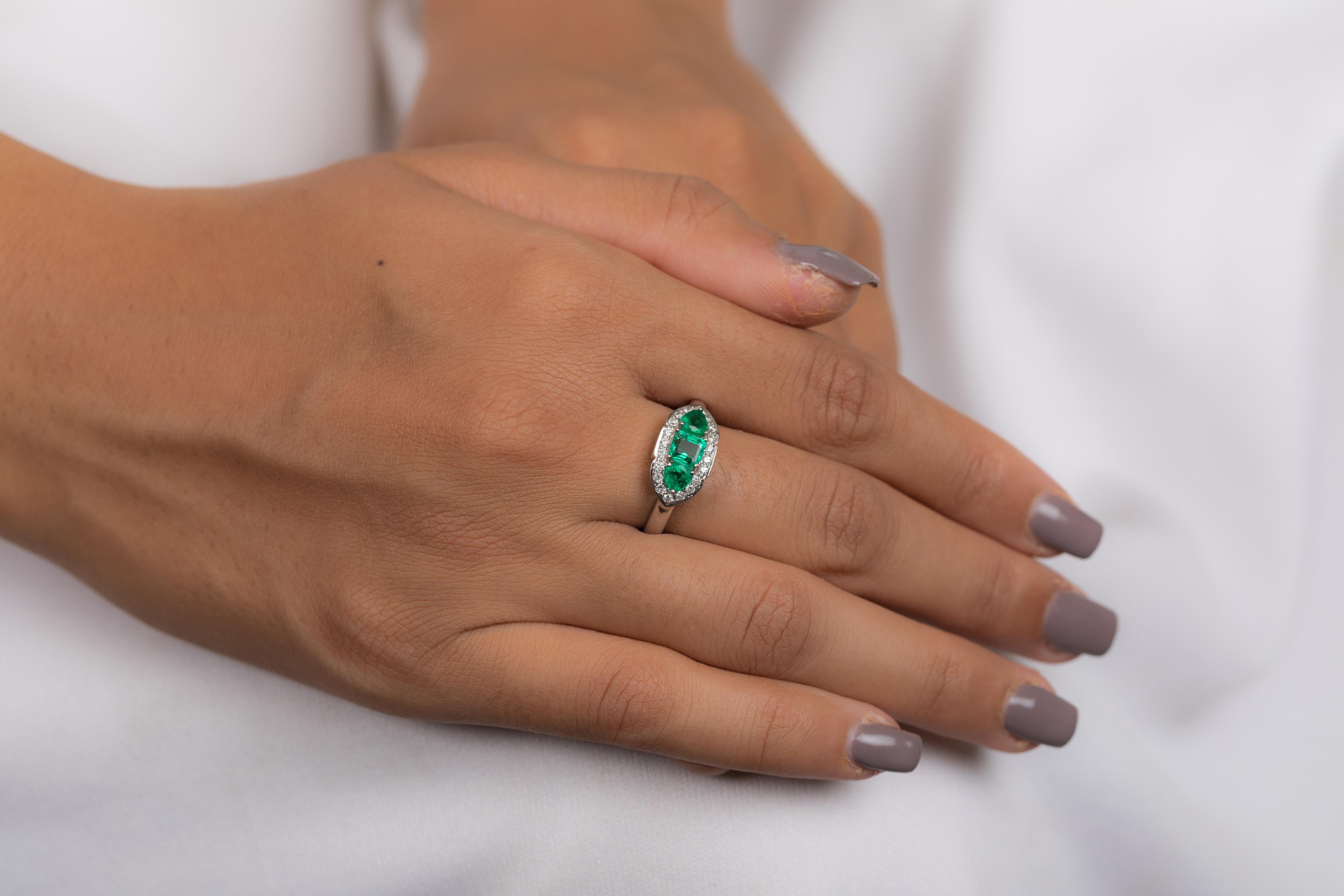 For Sale:  Three Stone Emerald and Diamond Ring in 18K White Gold 9