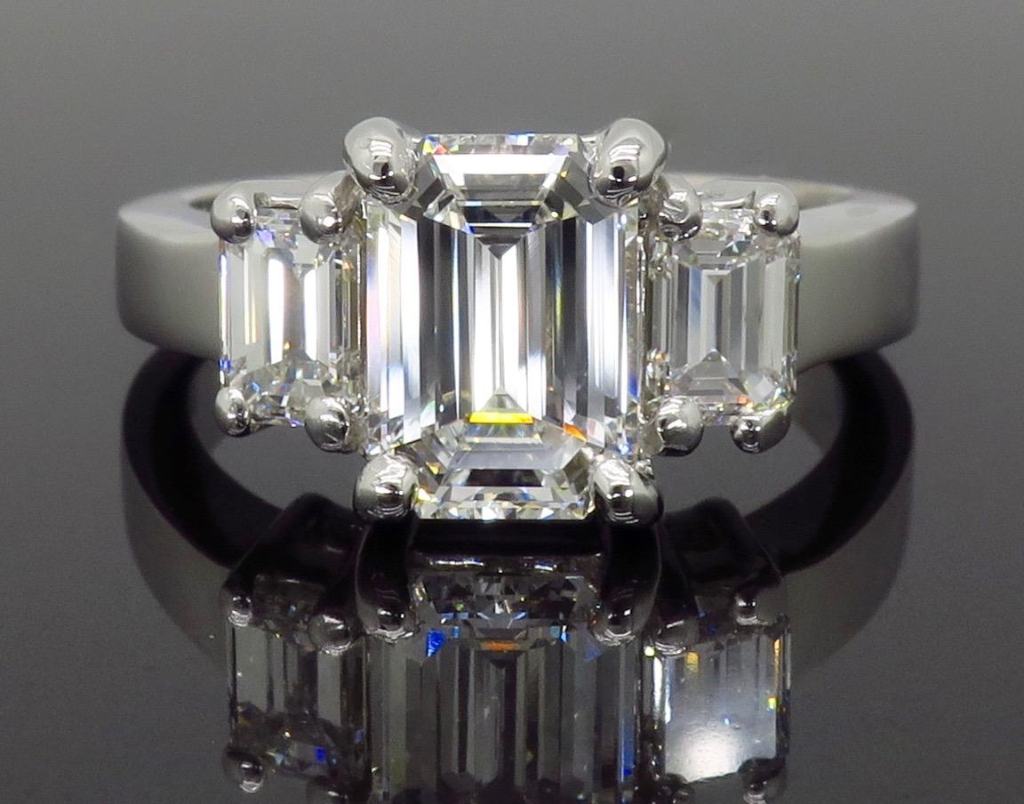 three stone emerald cut diamond ring