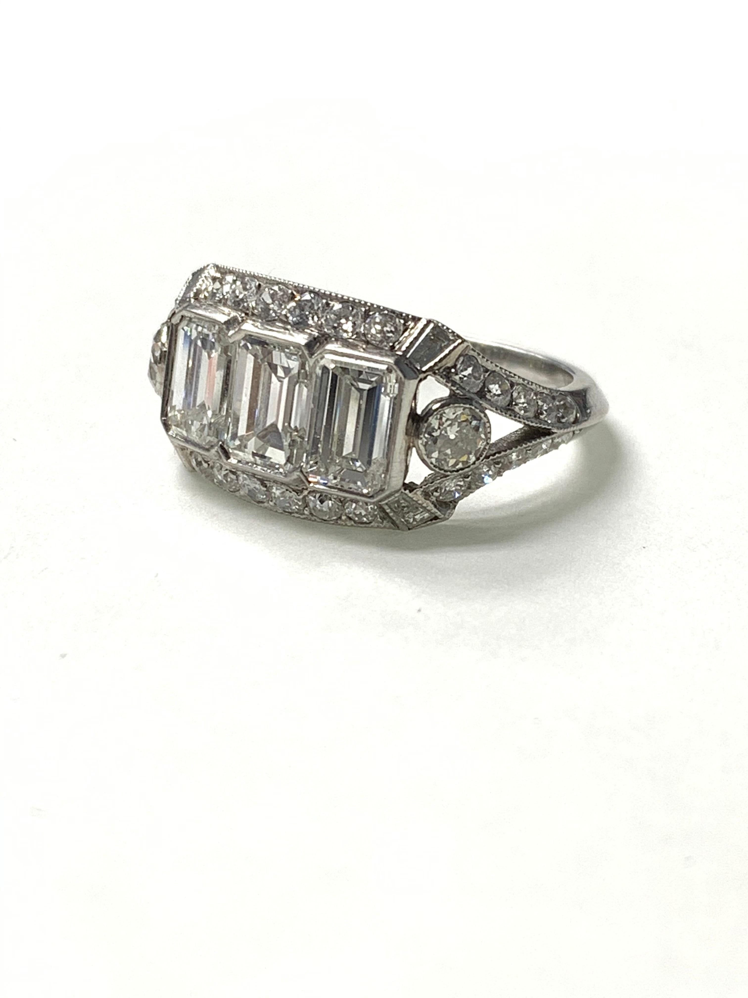 Three-Stone Emerald Cut Diamond Engagement Ring in Platinum For Sale 3