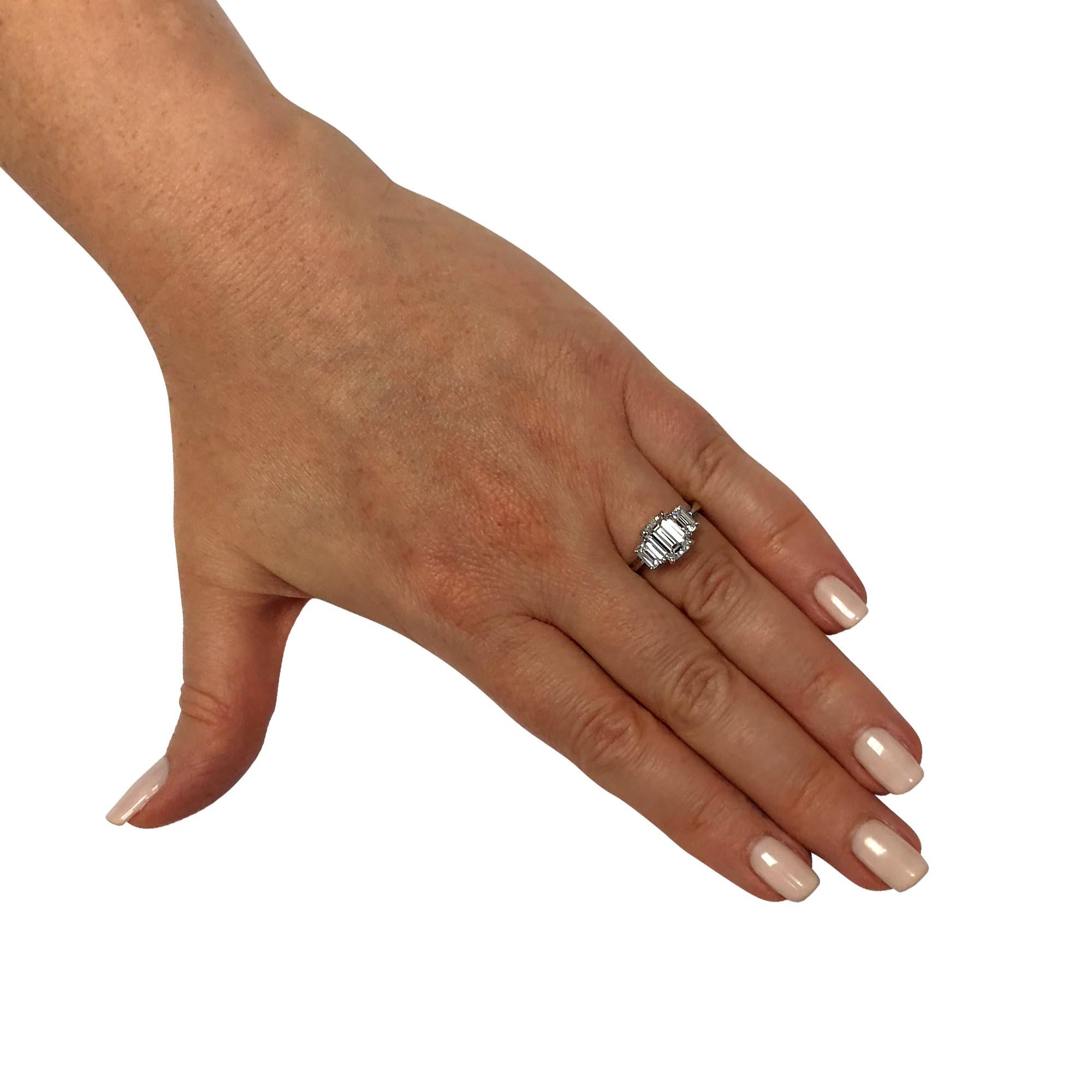 Modern Three-Stone Emerald Cut Diamond Platinum Engagement Ring
