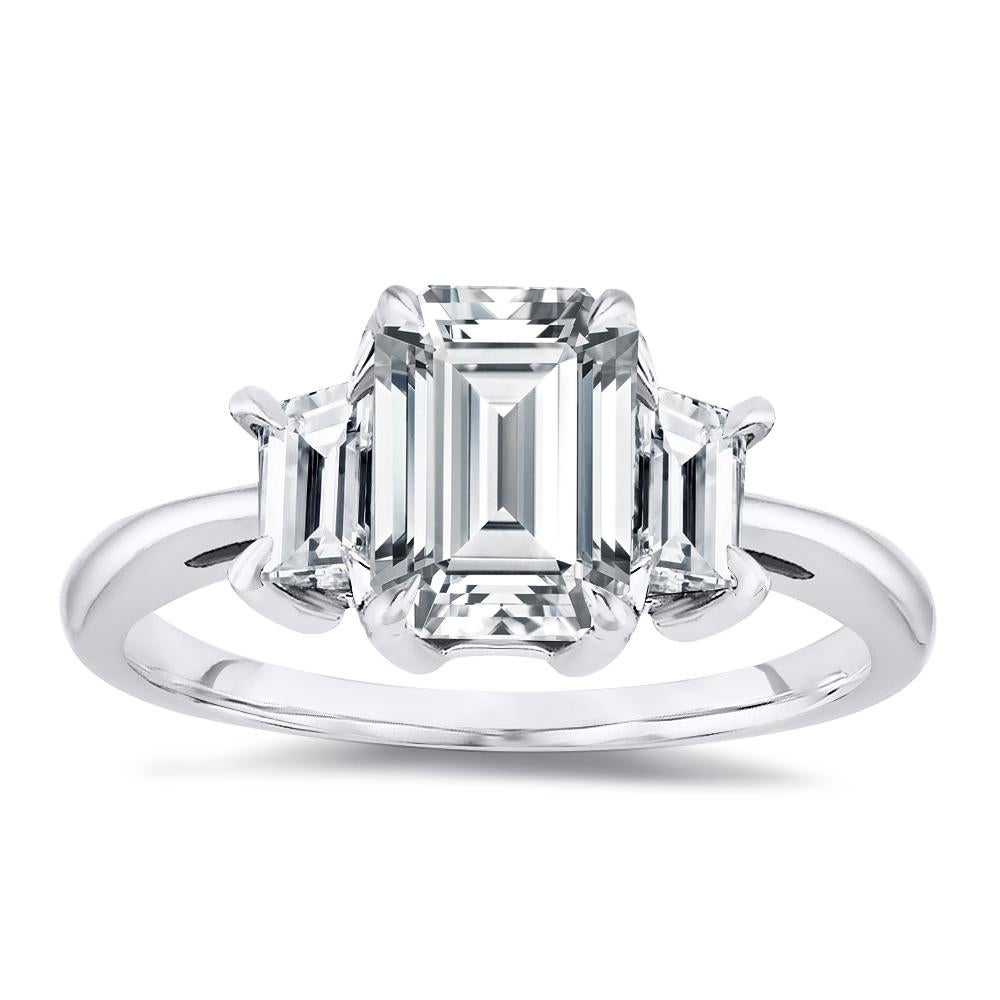 For Sale:  Three Stone Emerald Cut Diamond Ring 1.00 ctw. (0.70 ct. Center Diamond) 4
