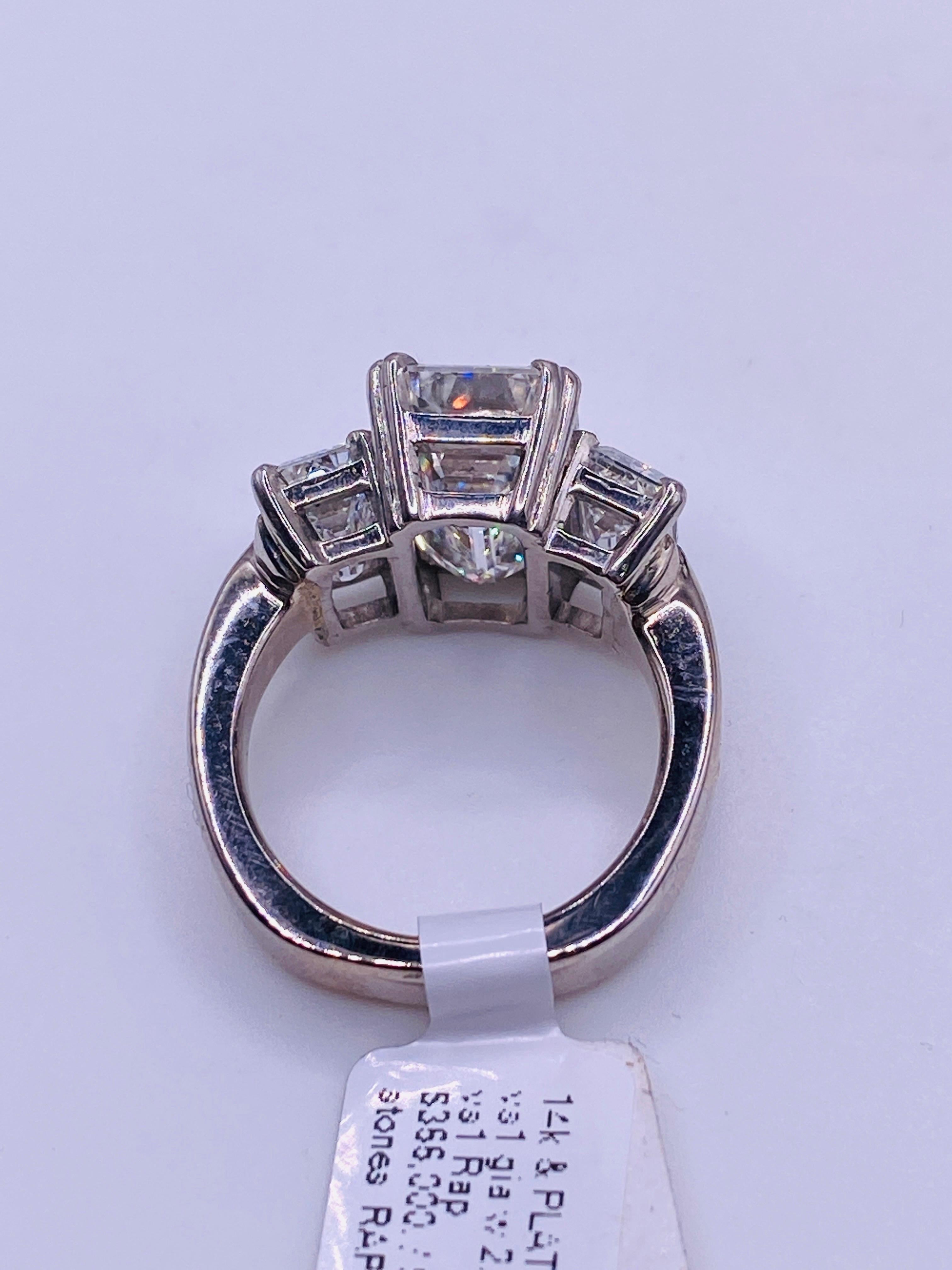 Three-Stone Emerald Cut Diamond Ring 1