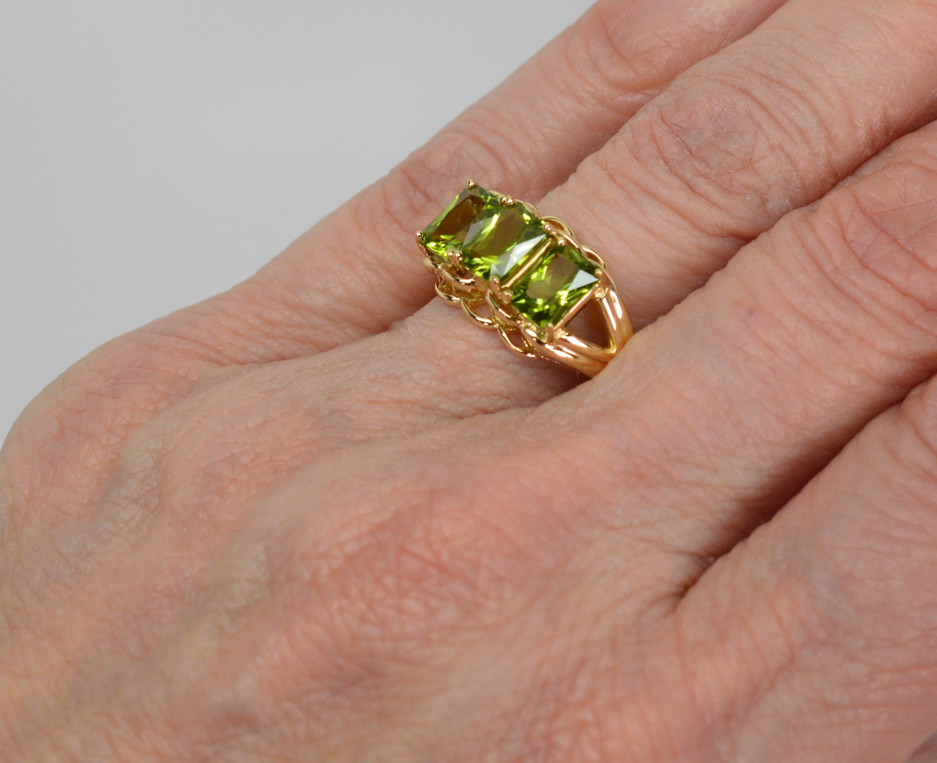 Three Stone Emerald Cut Peridot 14 Karat Yellow Gold Ring 5