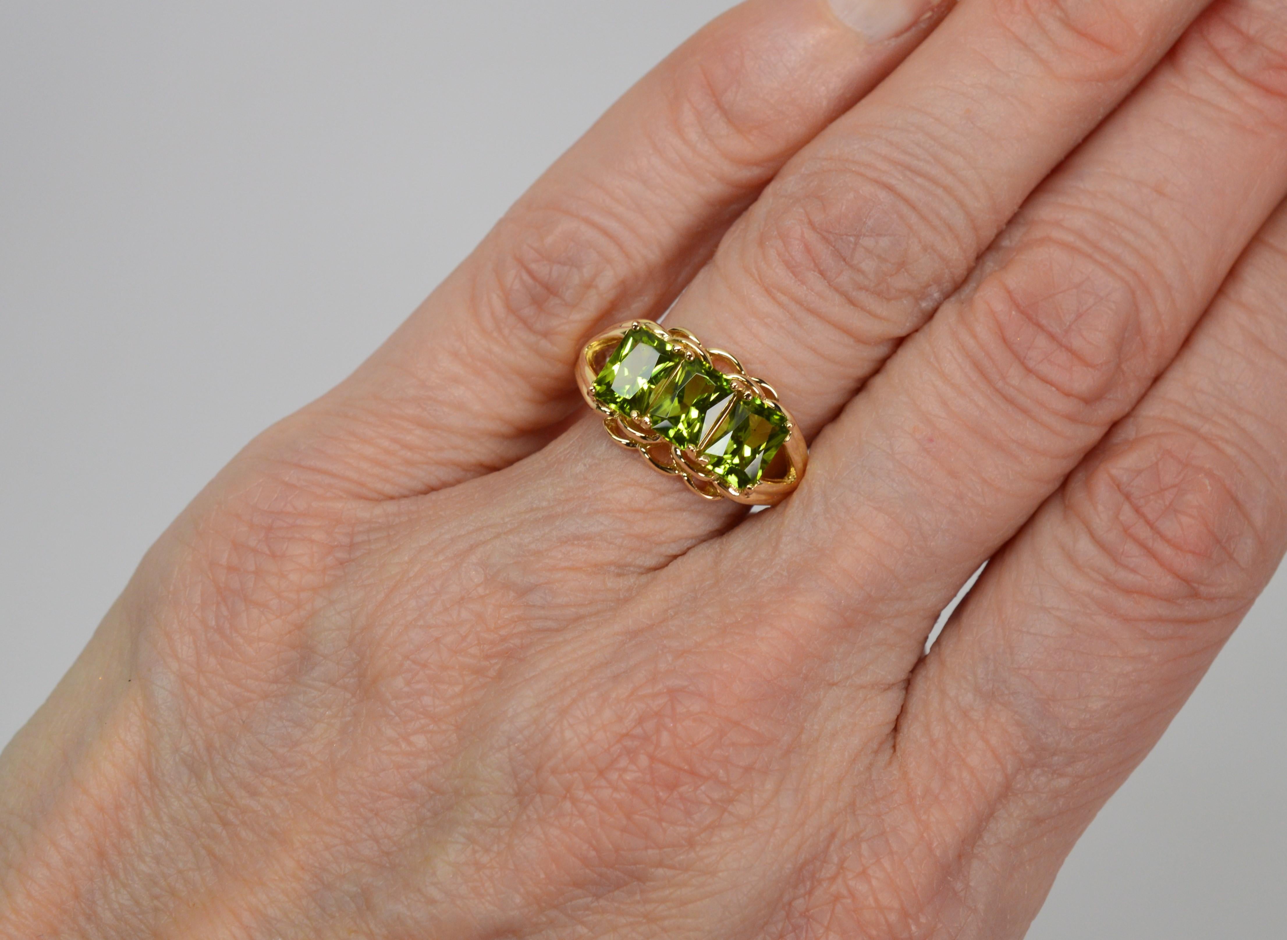 Three Stone Emerald Cut Peridot 14 Karat Yellow Gold Ring 3
