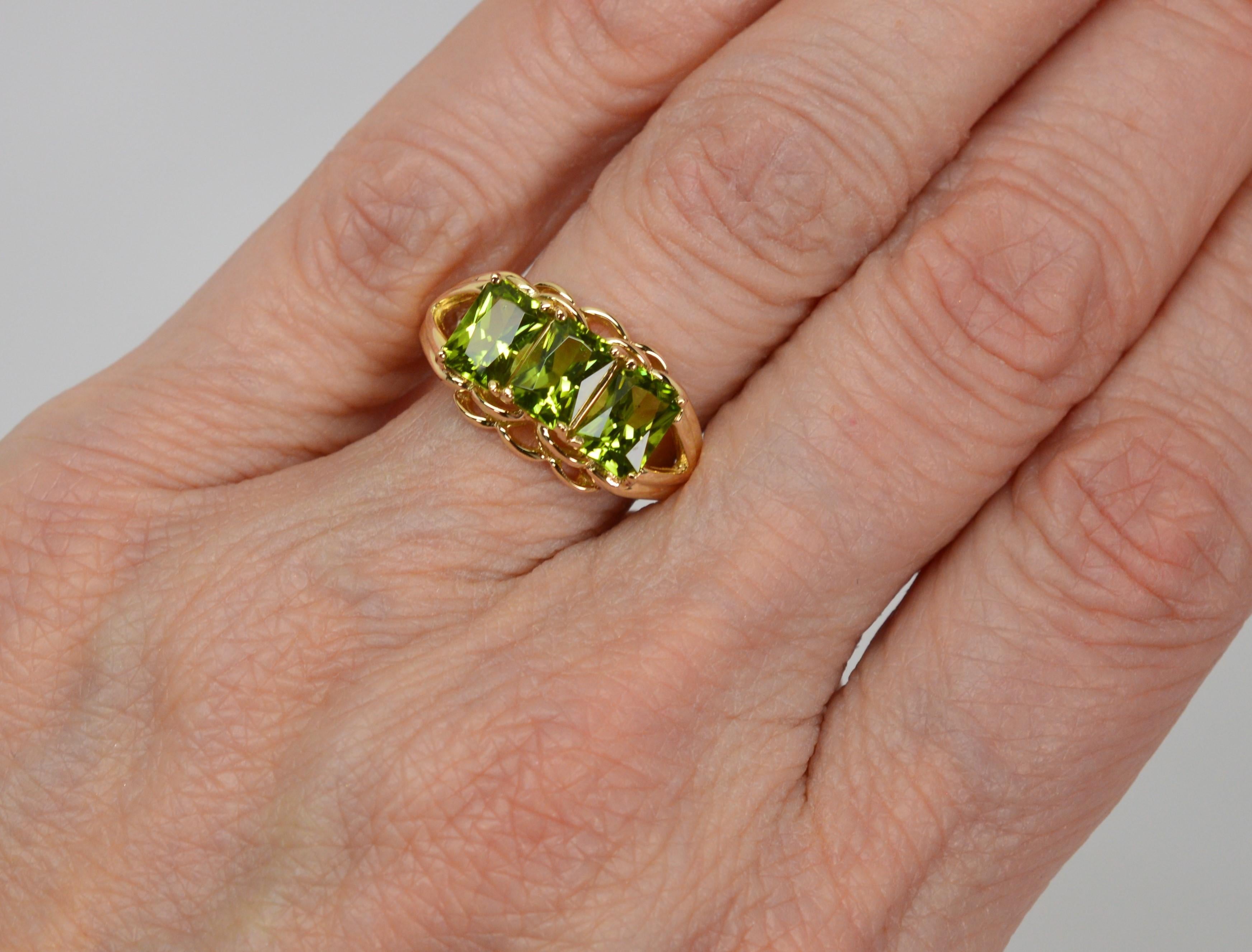 Three Stone Emerald Cut Peridot 14 Karat Yellow Gold Ring 4