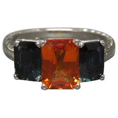 Retro Three-Stone Emerald Cut Sapphire Ring