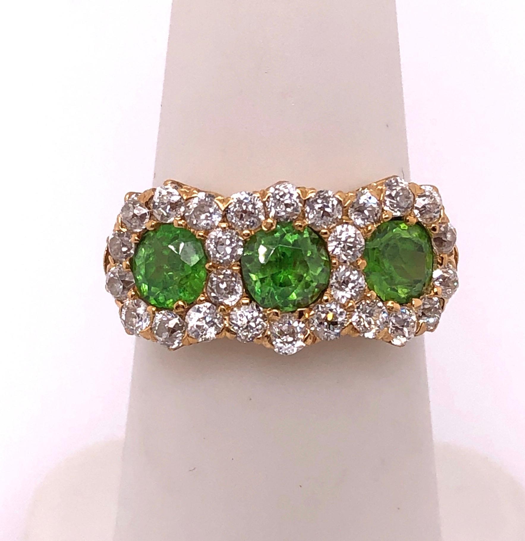 Three-Stone Emerald and Diamond Modern Ring In Good Condition For Sale In Stamford, CT