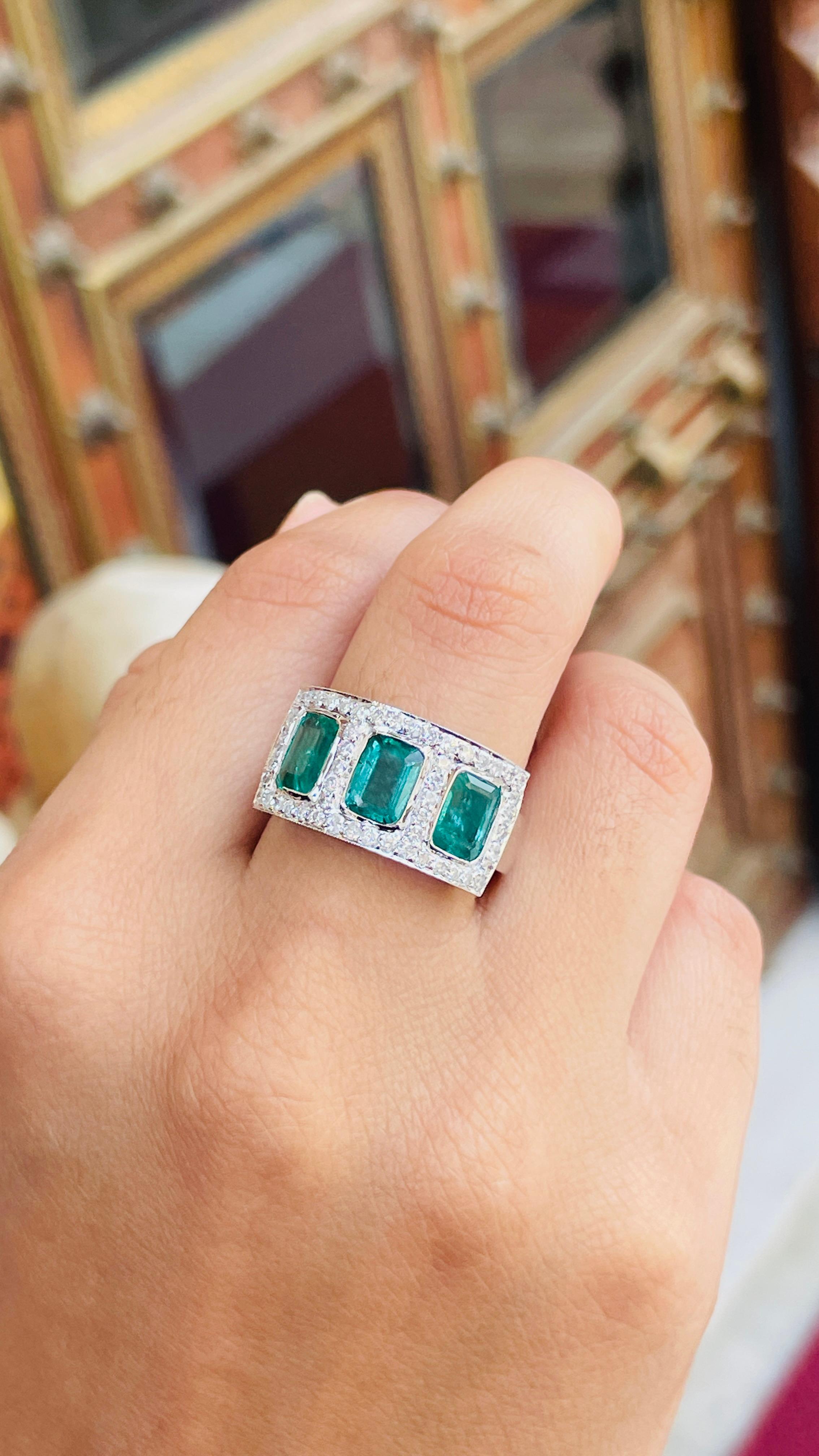 For Sale:  Three Stone Emerald Ring With Diamond in 18K White Gold 10