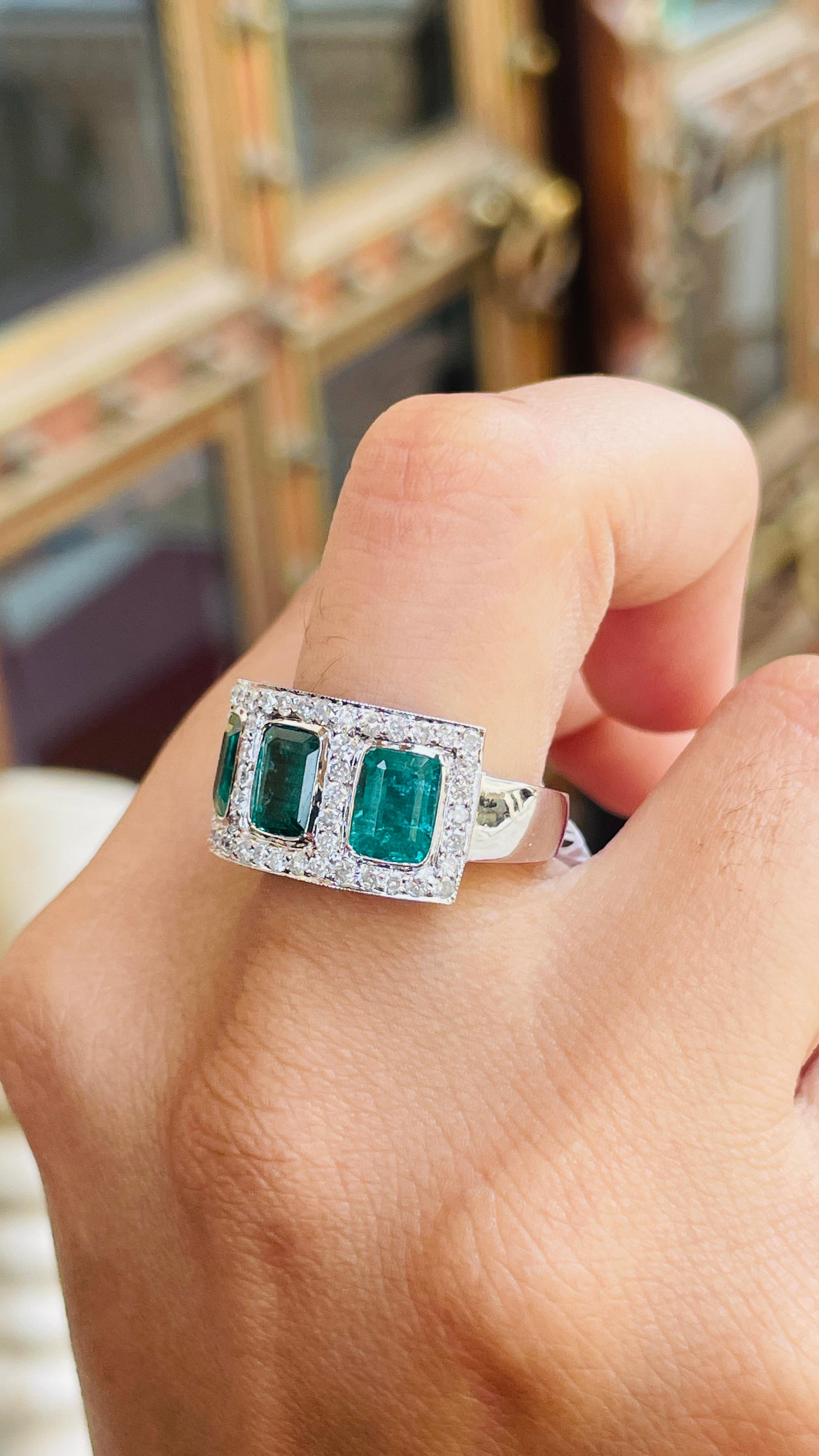 For Sale:  Three Stone Emerald Ring With Diamond in 18K White Gold 11