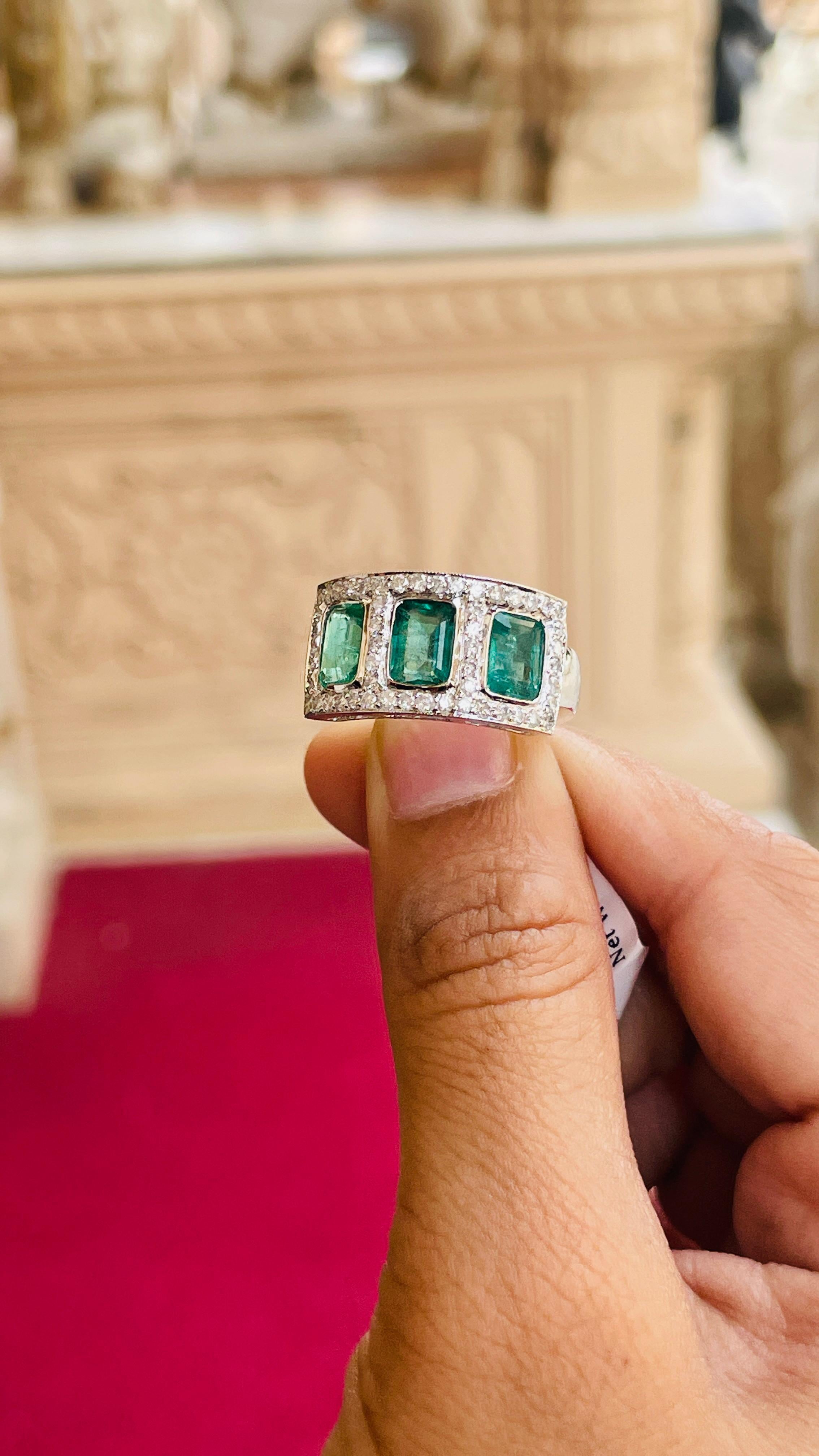 For Sale:  Three Stone Emerald Ring With Diamond in 18K White Gold 12
