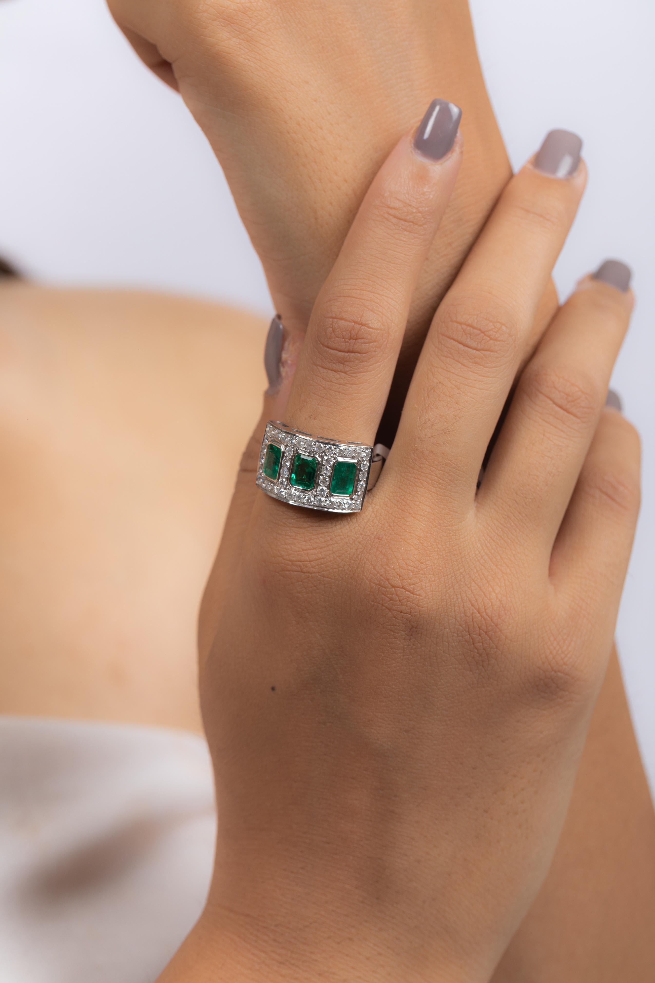 For Sale:  Three Stone Emerald Ring With Diamond in 18K White Gold 7