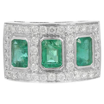 Three Stone Emerald Ring With Diamond in 18K White Gold